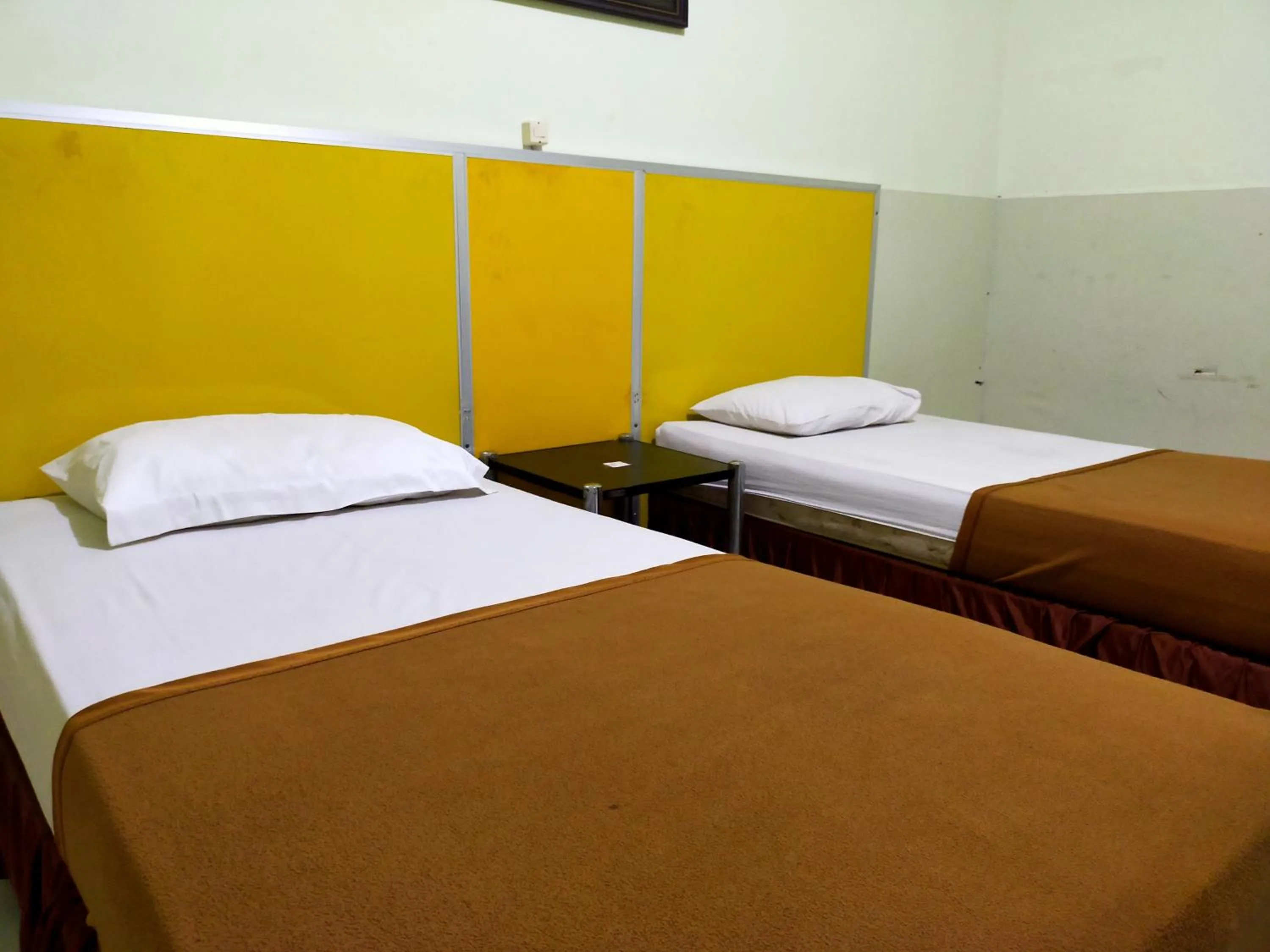 Bedroom, Bed in Hotel Nirwana Ternate RedPartner