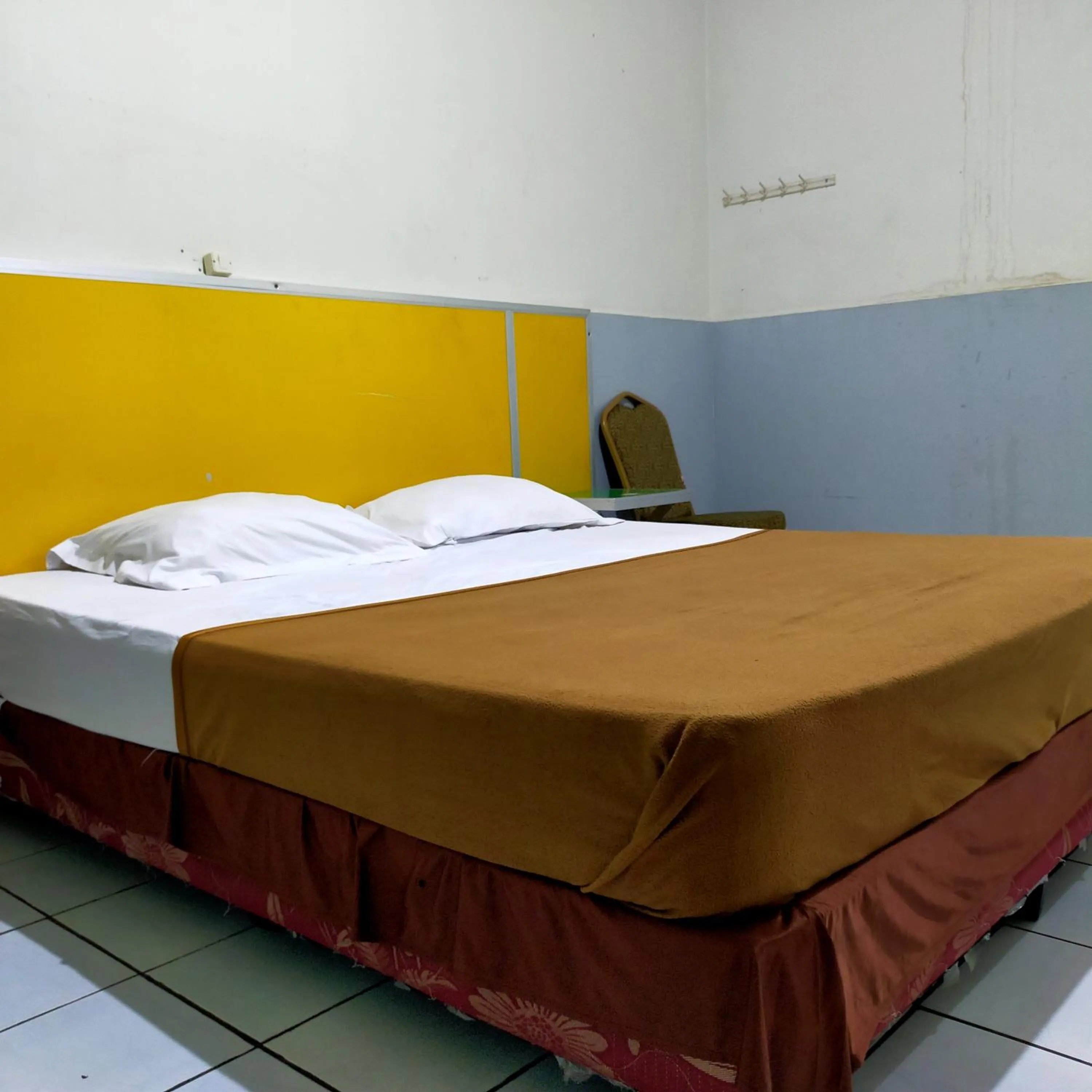 Bedroom, Bed in Hotel Nirwana Ternate RedPartner