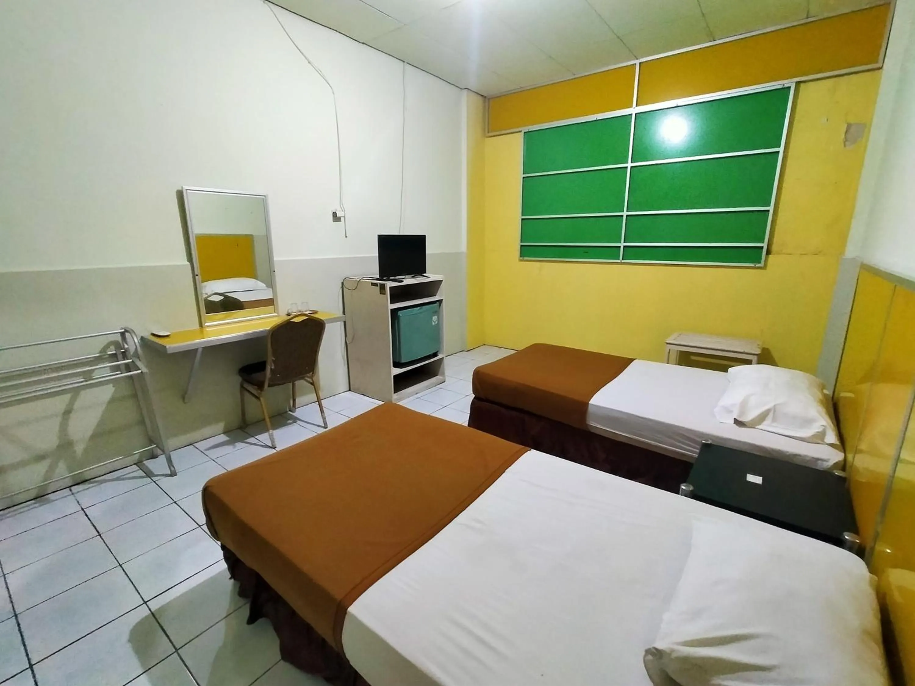 Bedroom, Bed in Hotel Nirwana Ternate RedPartner