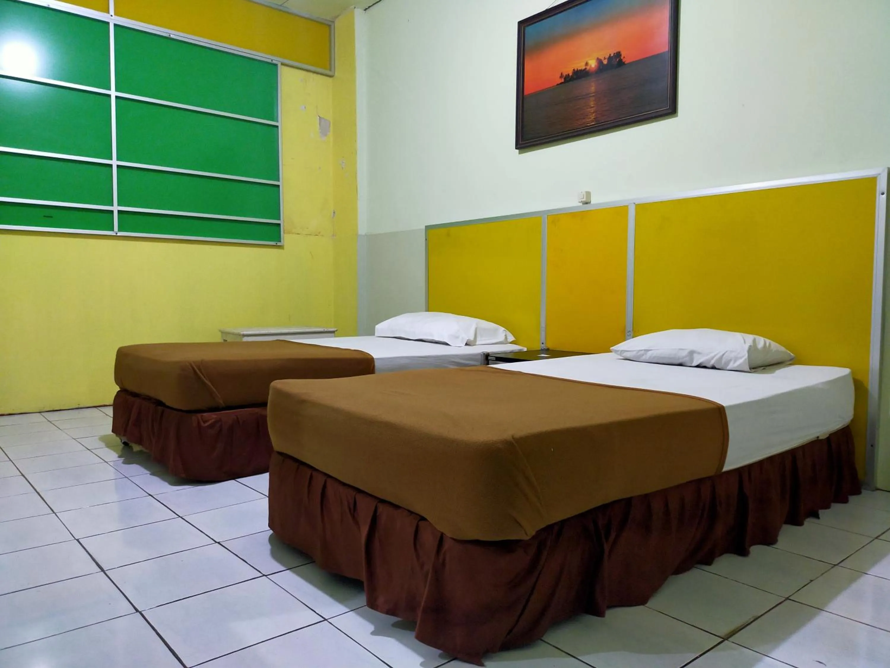 Bedroom, Bed in Hotel Nirwana Ternate RedPartner