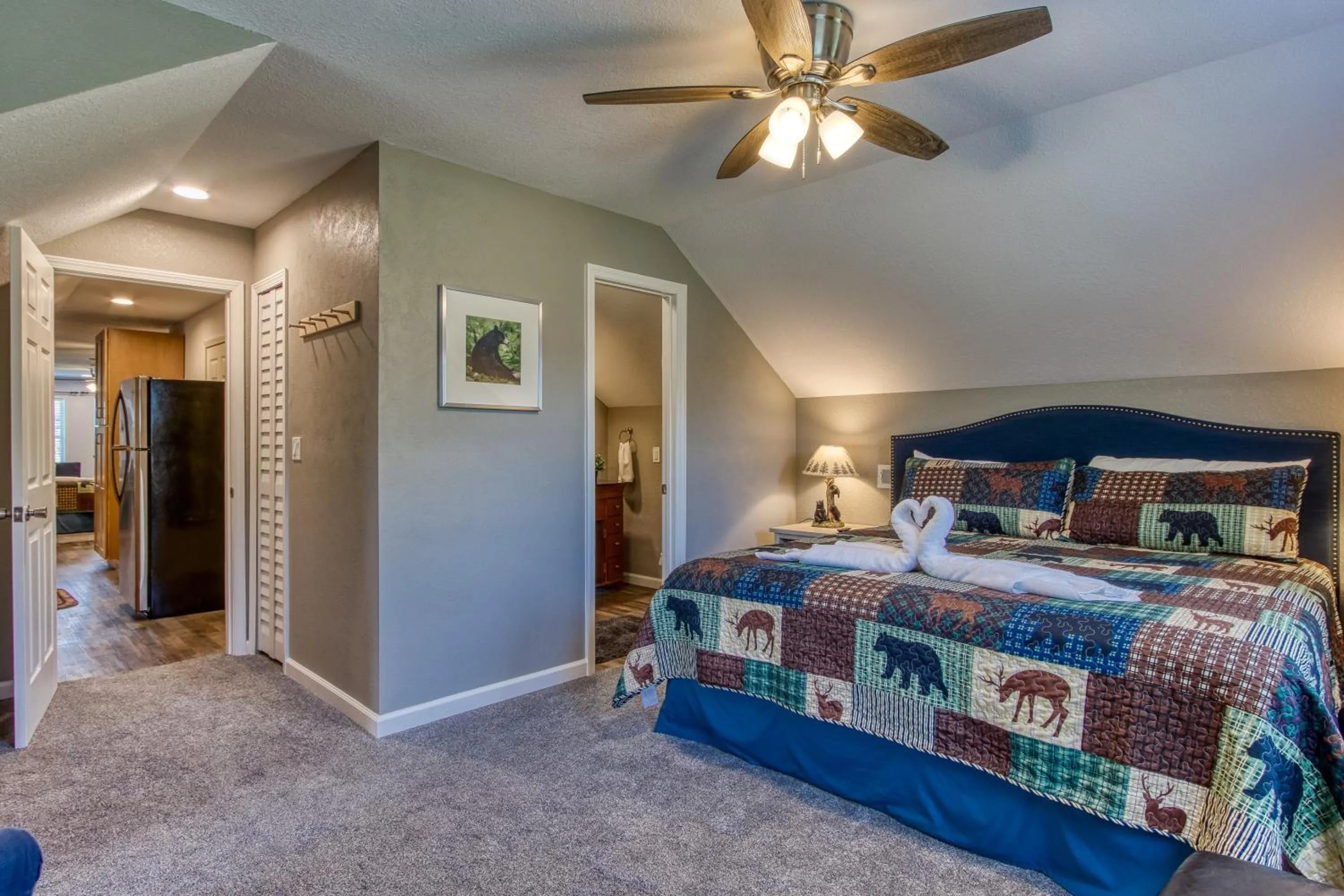 Bed in Rustic River Lodge by HoneyBearCabins 7BR 6BA sleeps 21