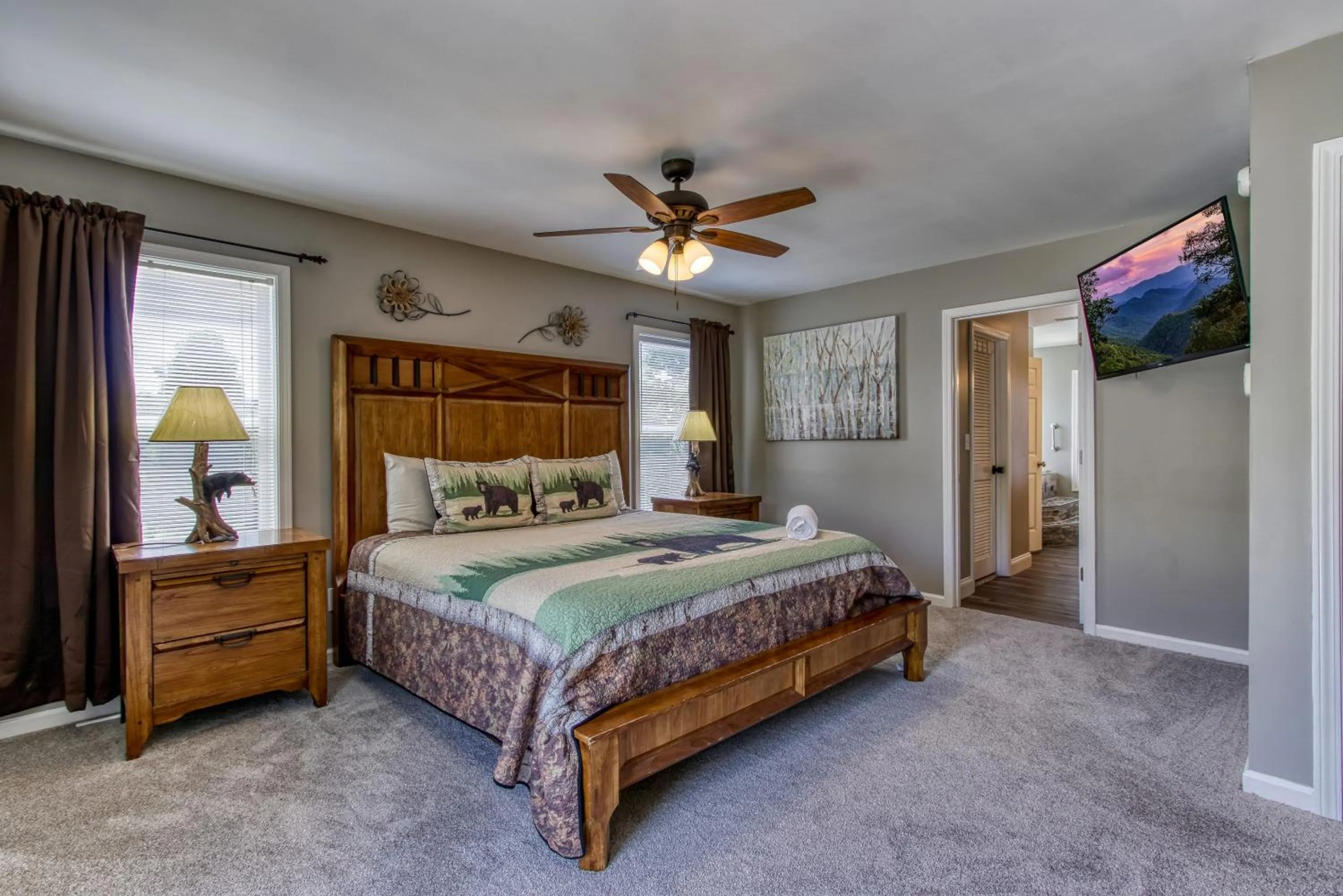 Bed in Rustic River Lodge by HoneyBearCabins 7BR 6BA sleeps 21