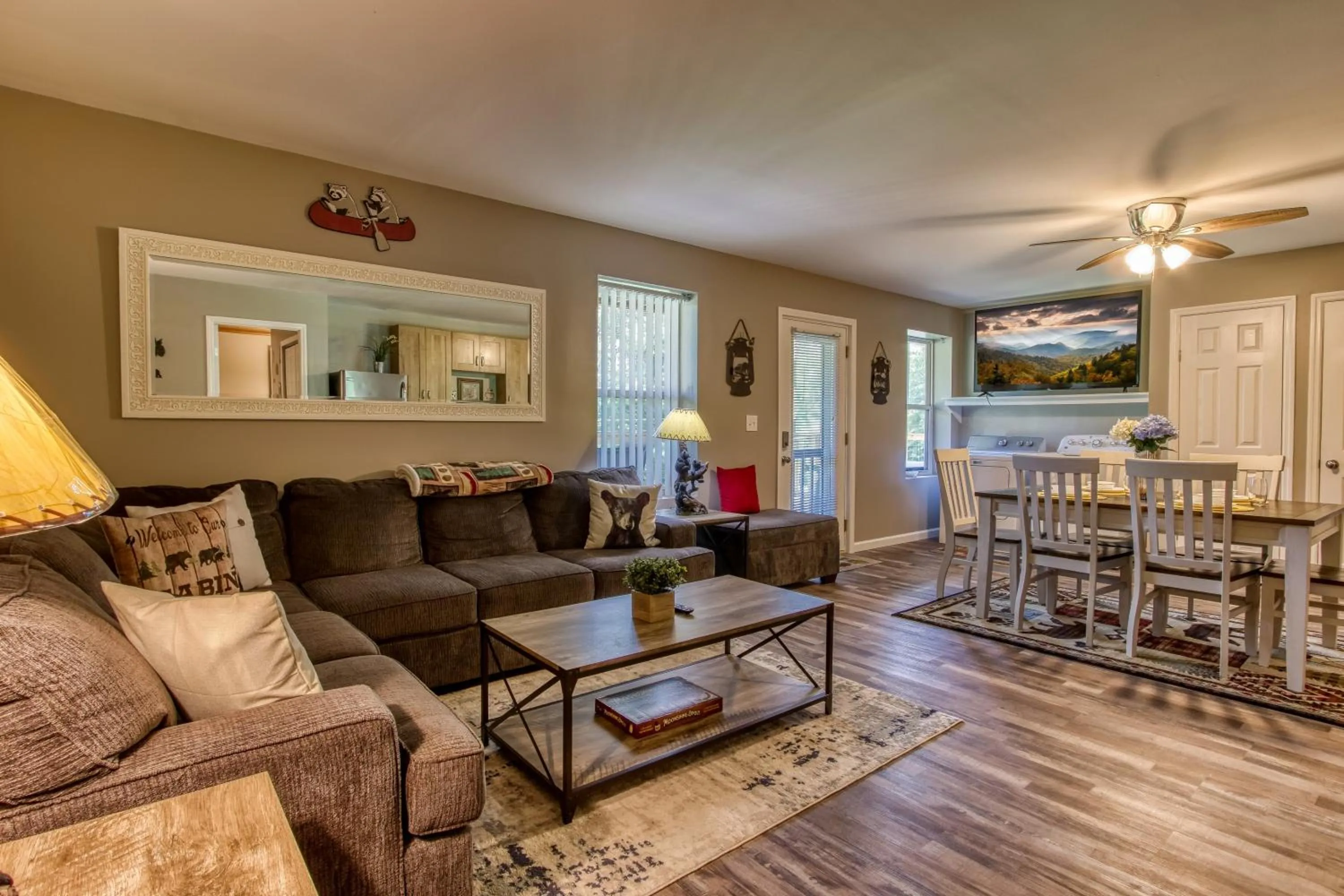 TV and multimedia in Rustic River Lodge by HoneyBearCabins 7BR 6BA sleeps 21