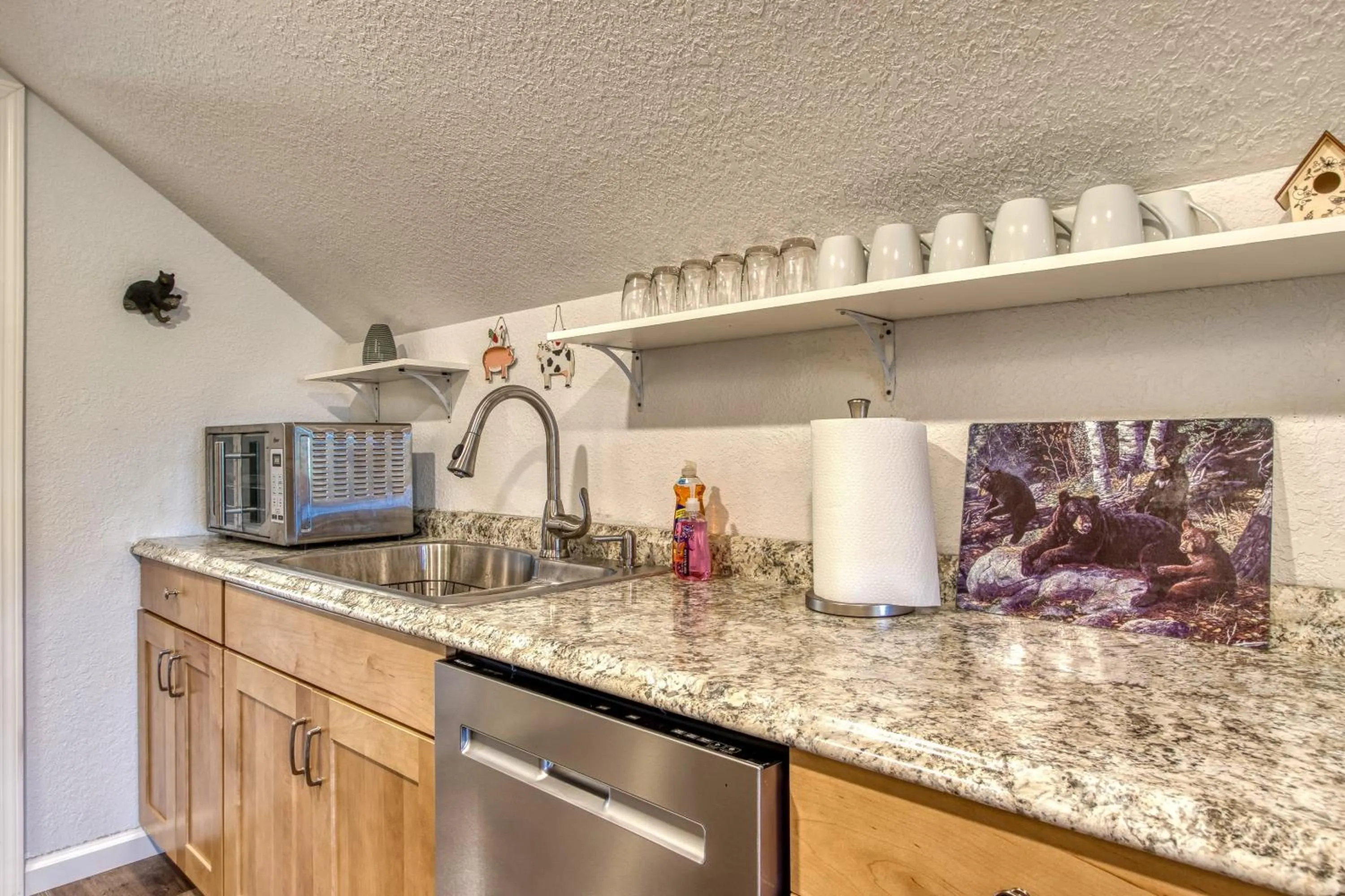 Kitchen or kitchenette in Rustic River Lodge by HoneyBearCabins 7BR 6BA sleeps 21