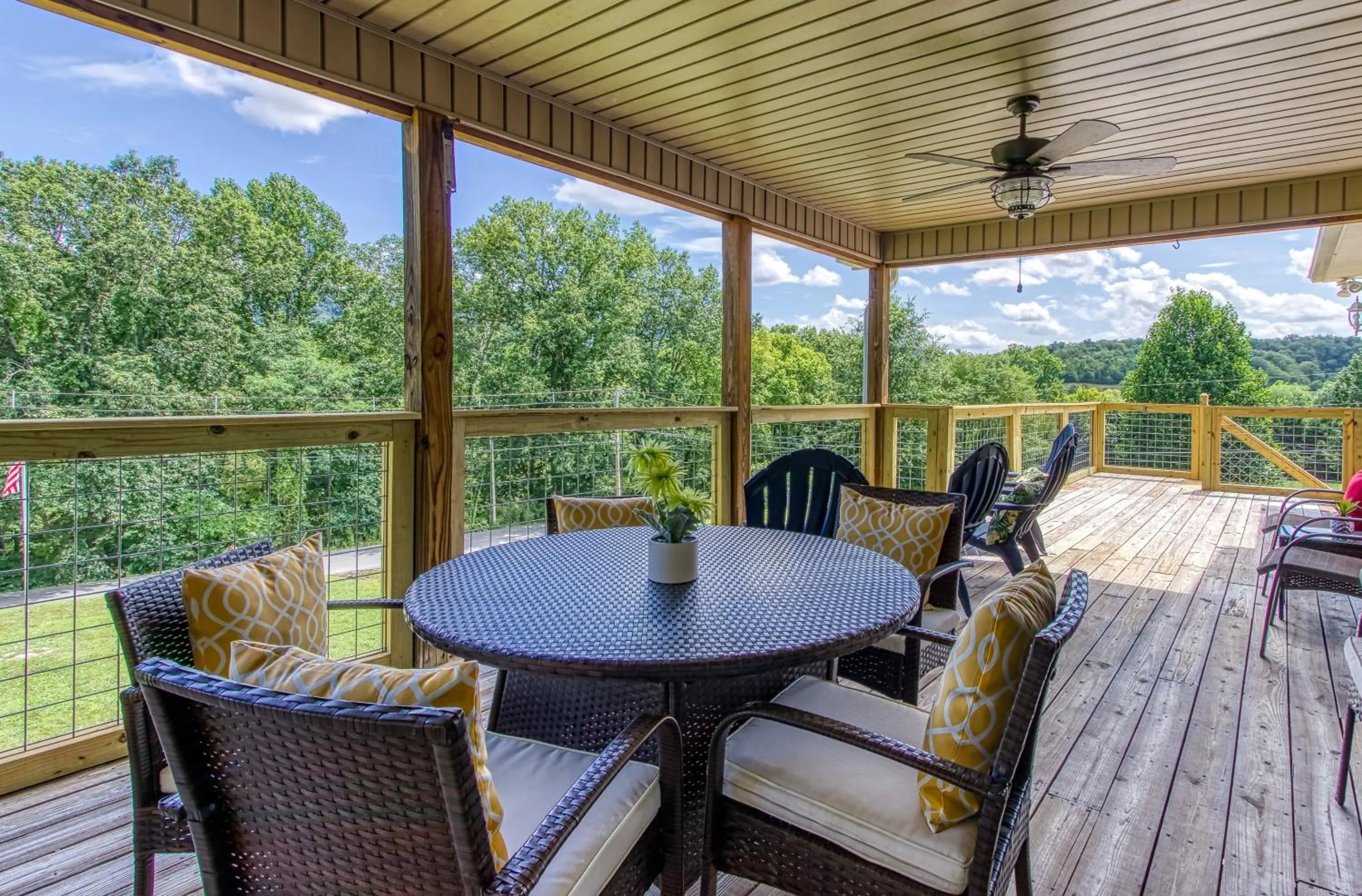 Patio in Rustic River Lodge by HoneyBearCabins 7BR 6BA sleeps 21