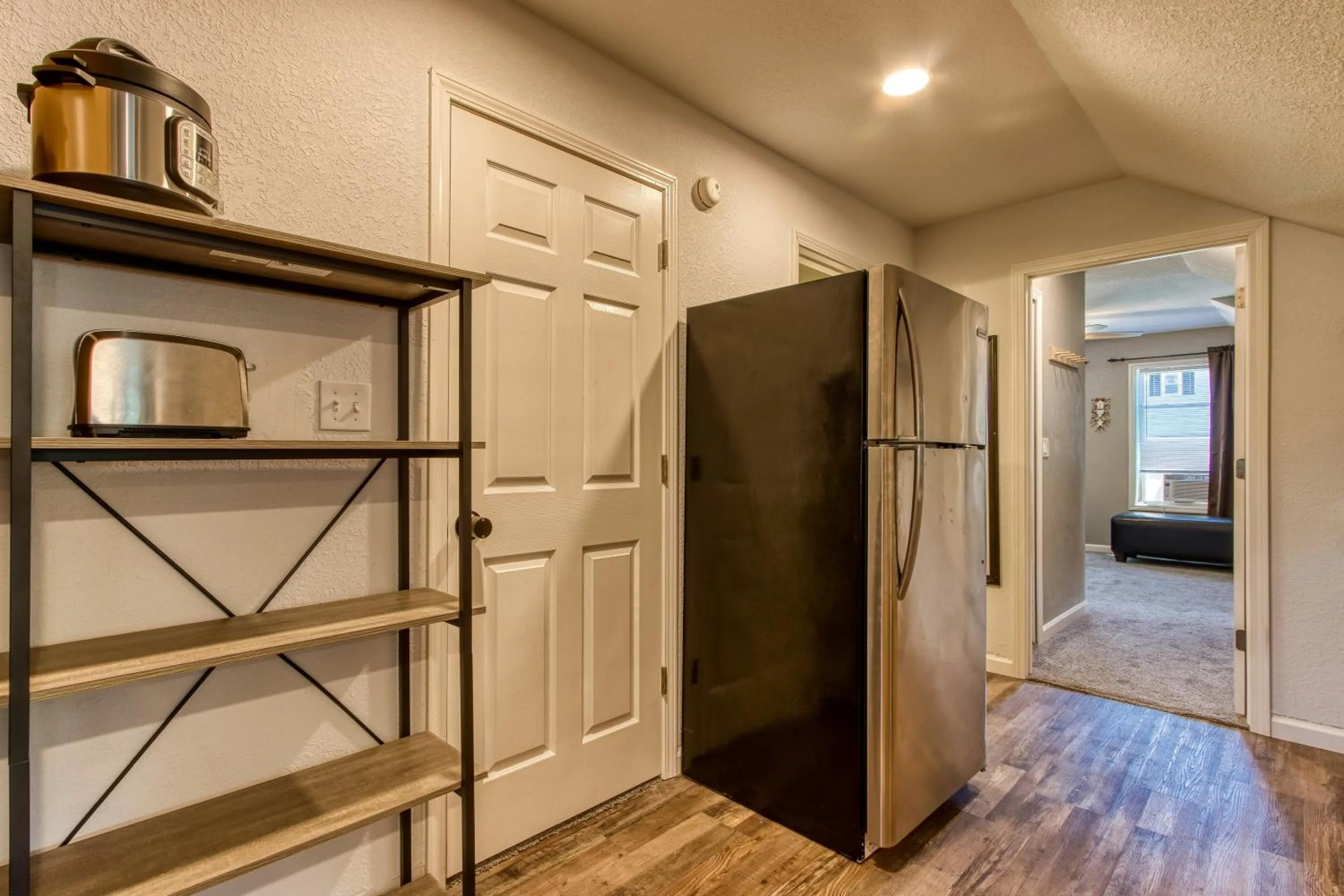 Kitchen or kitchenette in Rustic River Lodge by HoneyBearCabins 7BR 6BA sleeps 21