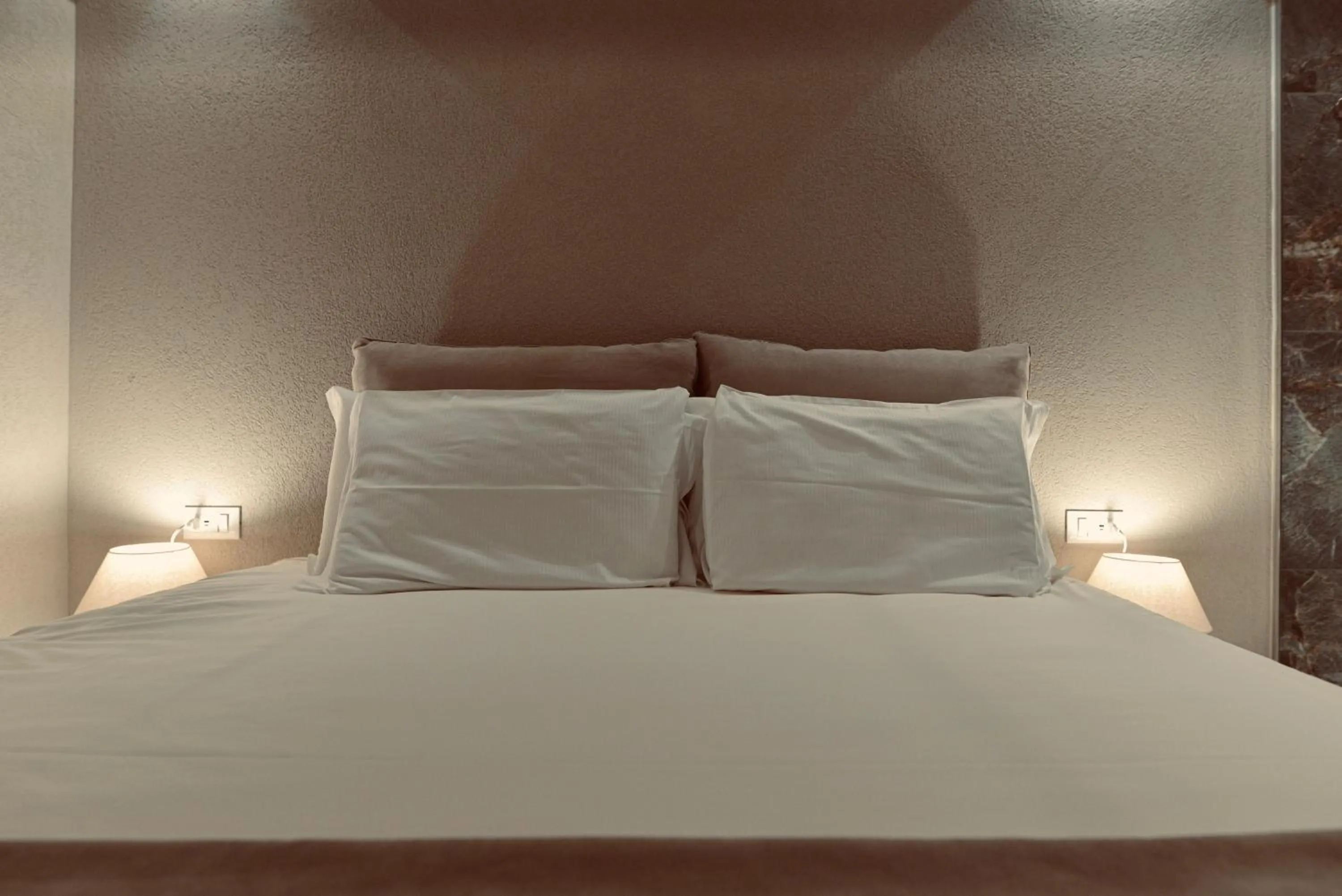 Bed in Palermo Inn Boutique Hotel