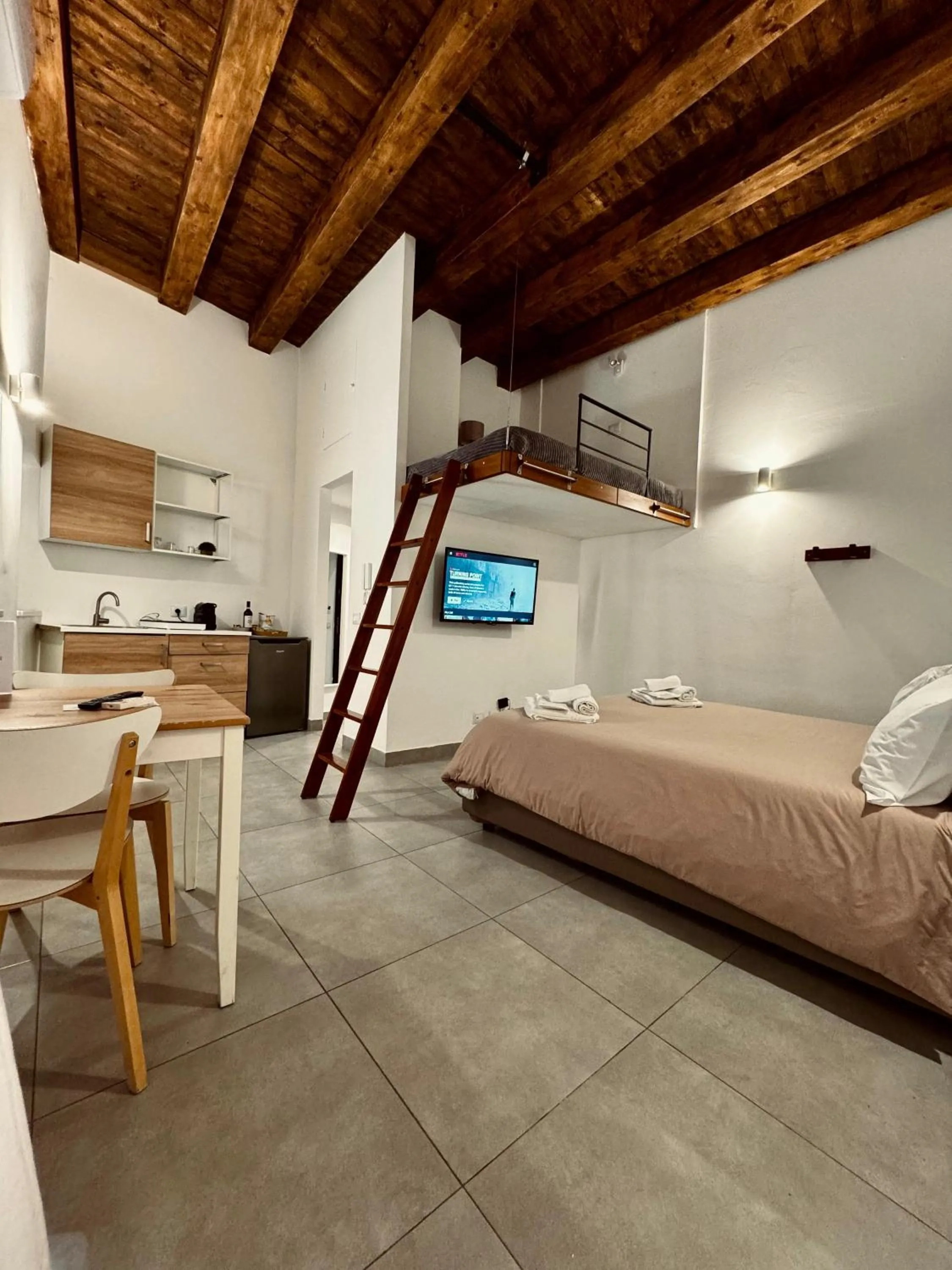 Bed in Palermo Inn Boutique Hotel