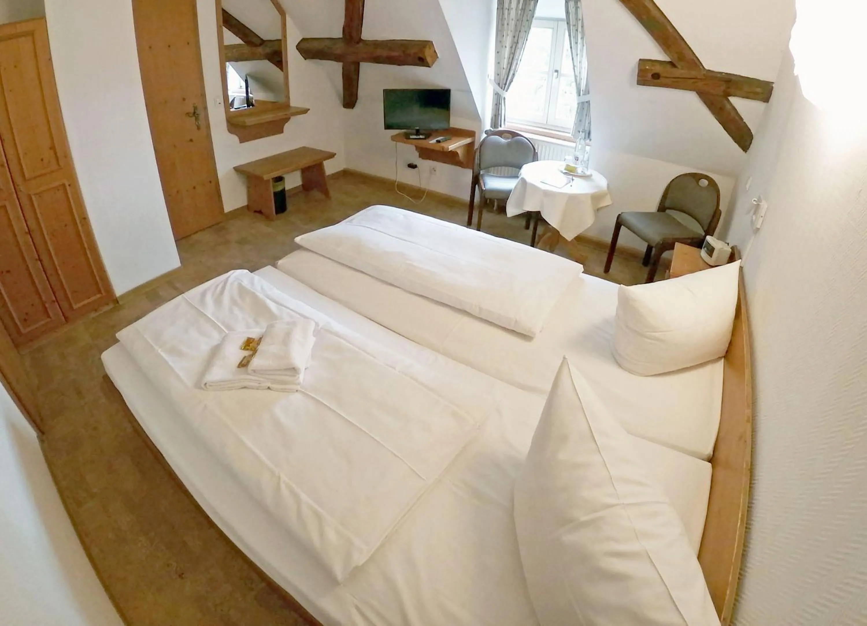 Photo of the whole room, Bed in Hotel Brauhaus Wiesenmühle