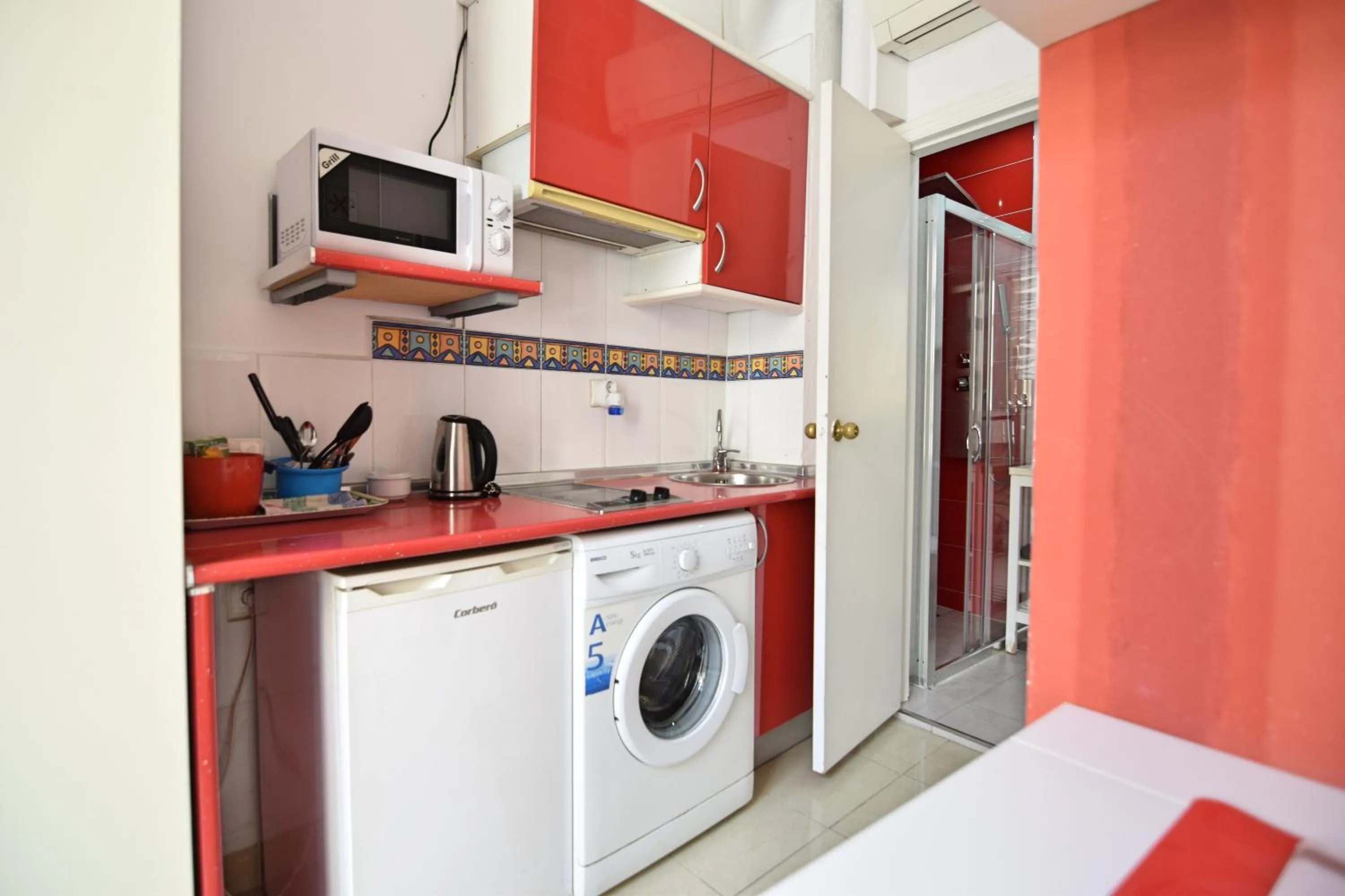Kitchen or kitchenette in Apartamentos Marques De La Merced