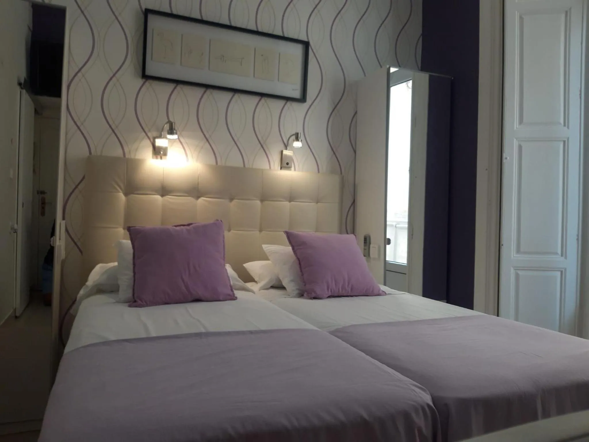 Bed in Apartamentos Marques De La Merced