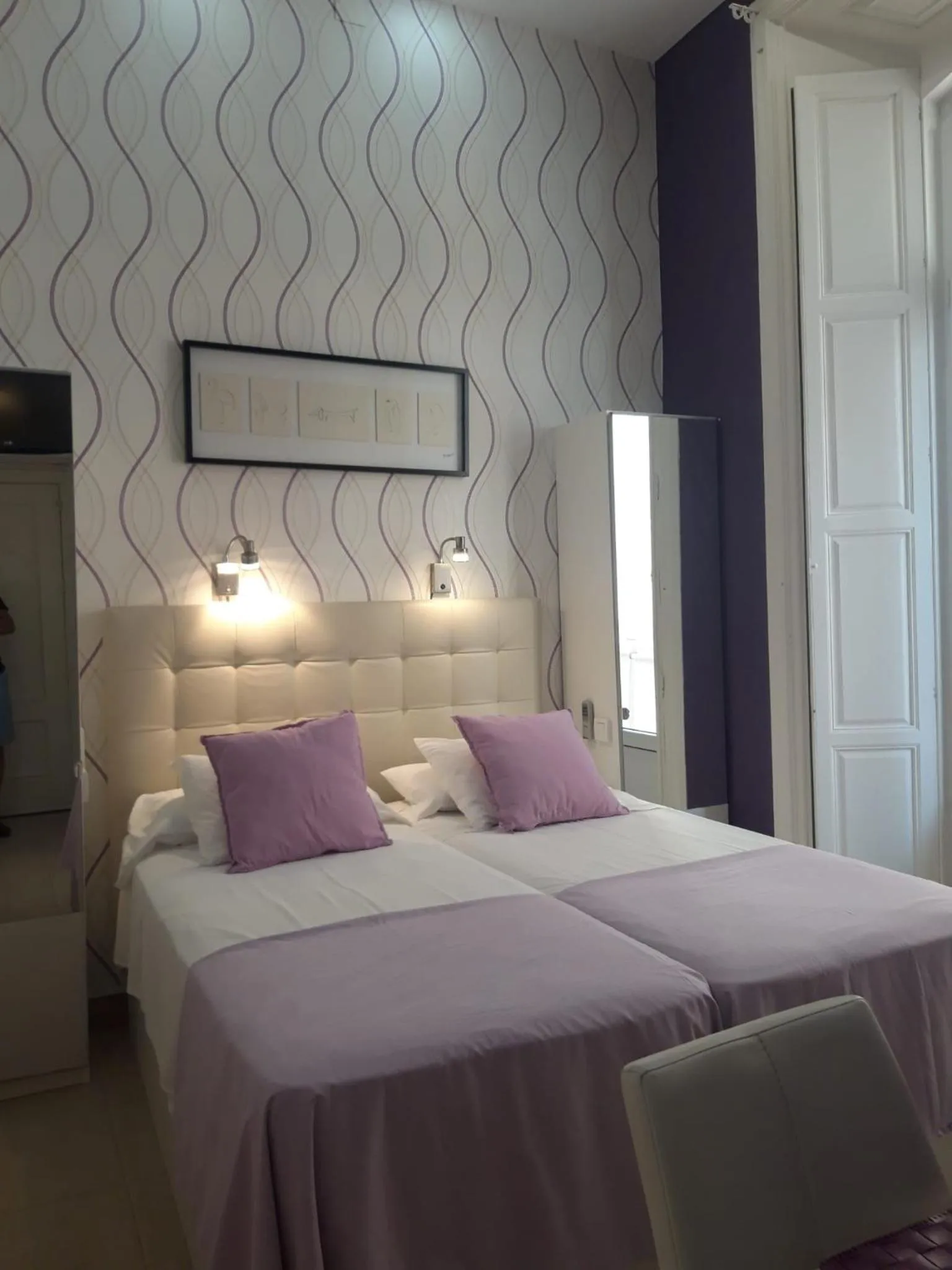 Bed in Apartamentos Marques De La Merced