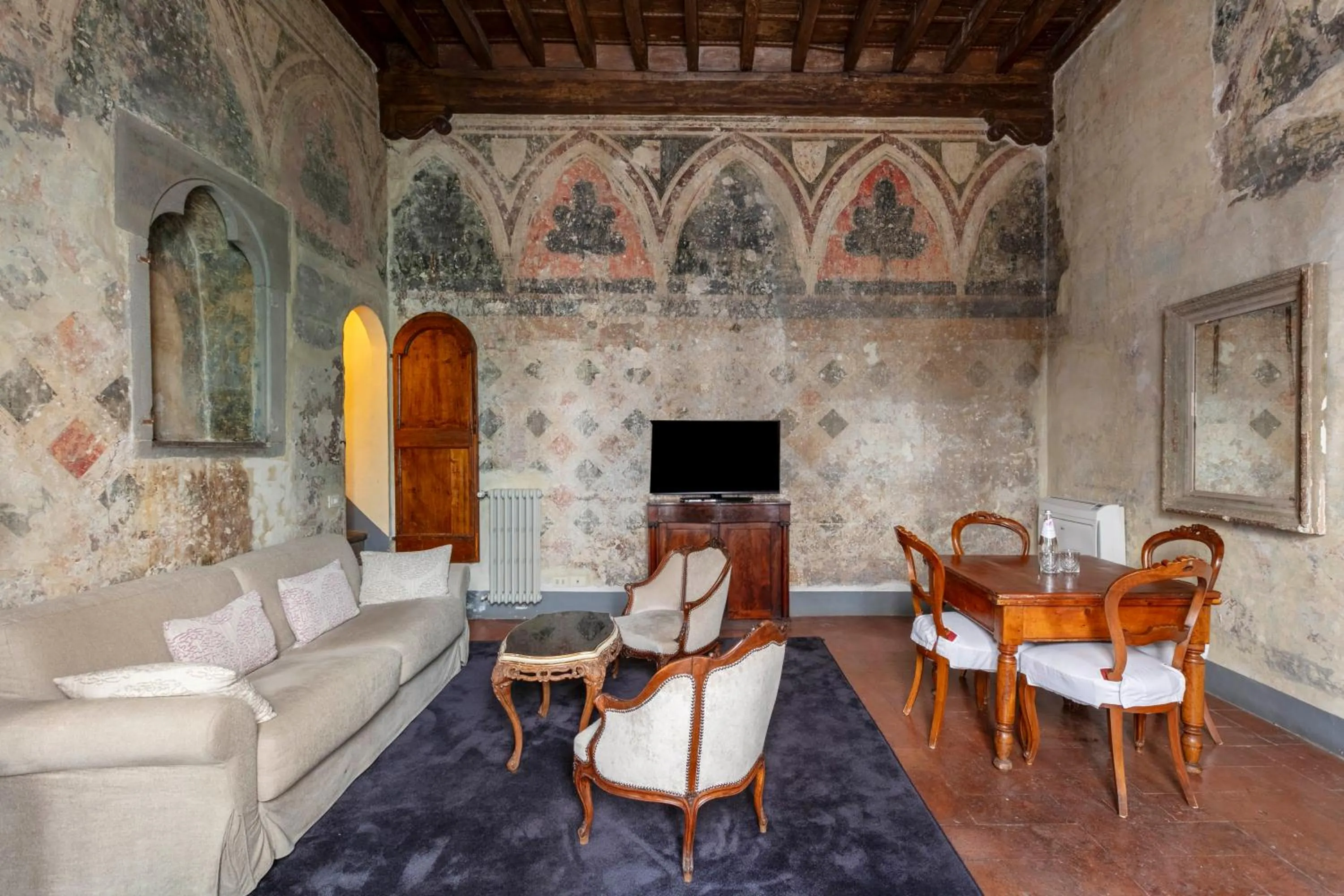Communal lounge/ TV room in Numa Florence Palazzo Belfiore
