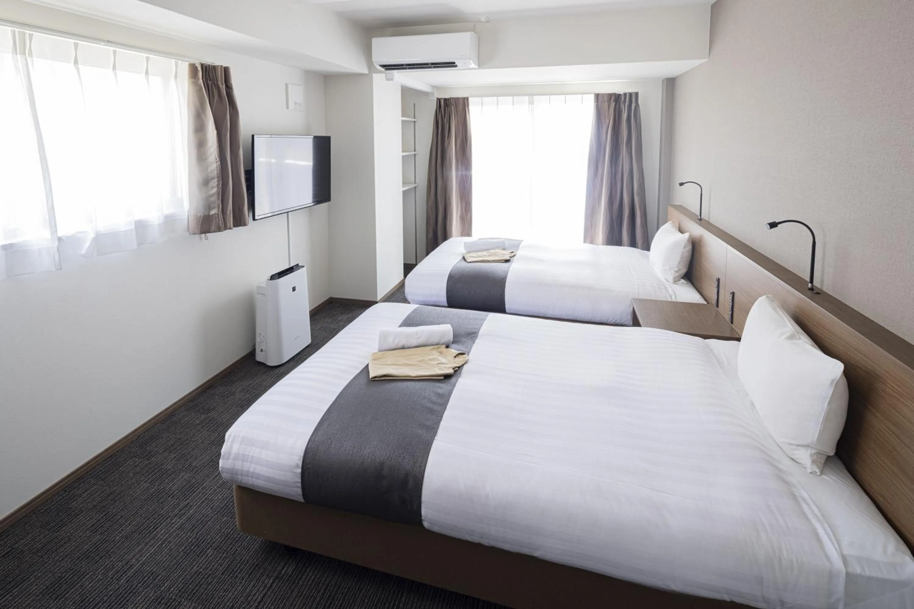 Photo of the whole room, Bed in Coruscant Hotel NagasakiekiⅢ