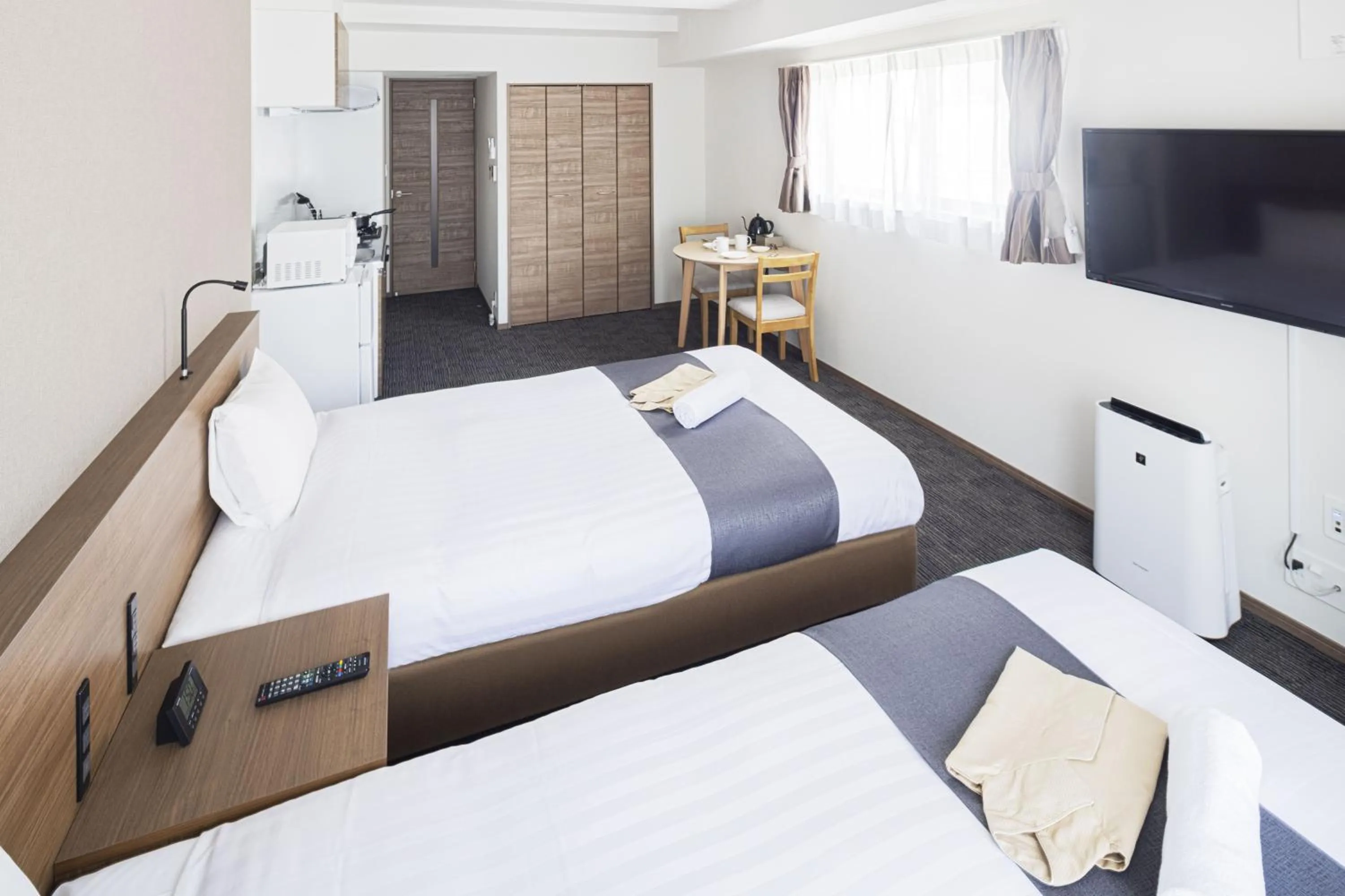 Photo of the whole room, Bed in Coruscant Hotel NagasakiekiⅢ