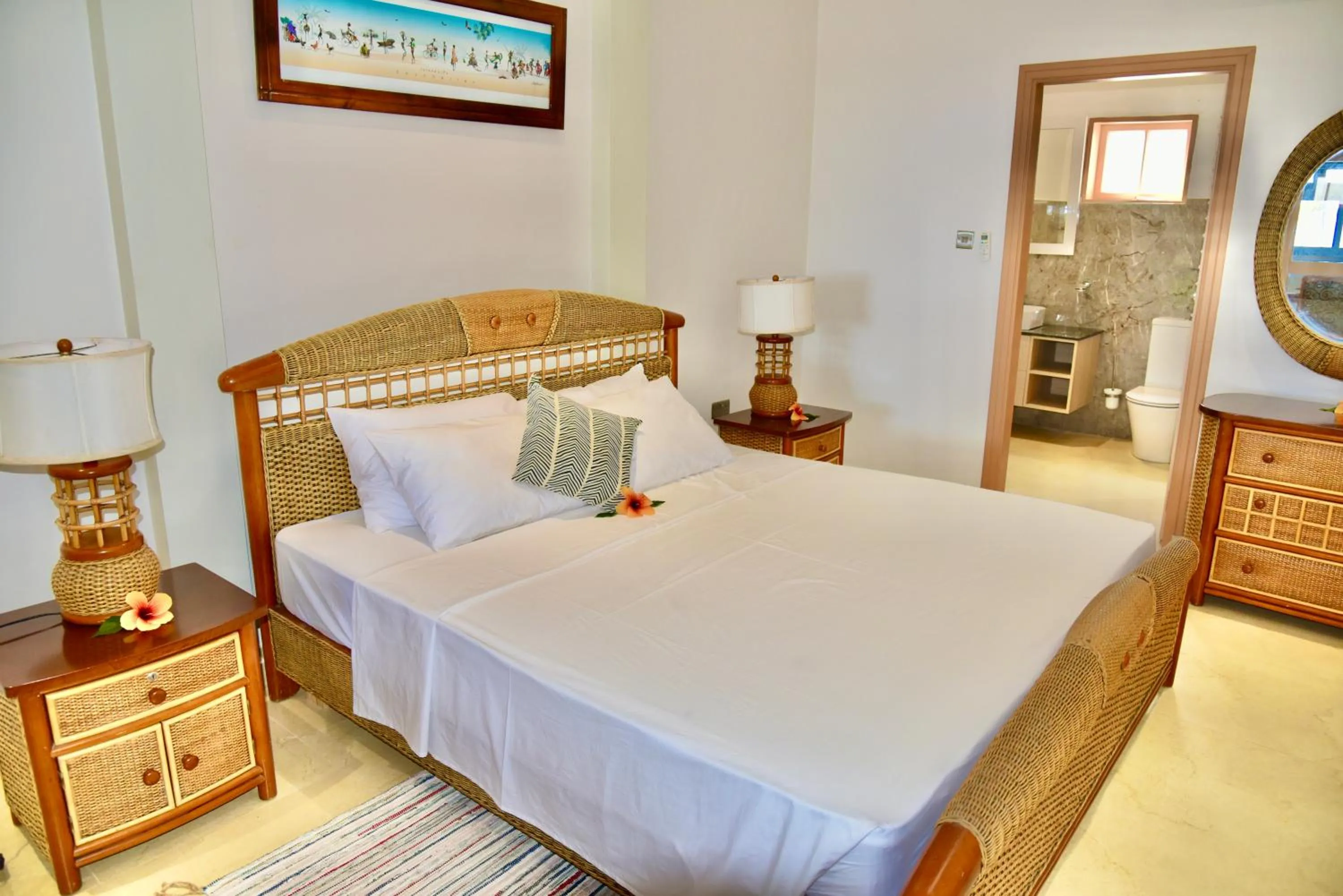 Bed in SEA SPLASH SELF CATERING And La Petite Maison