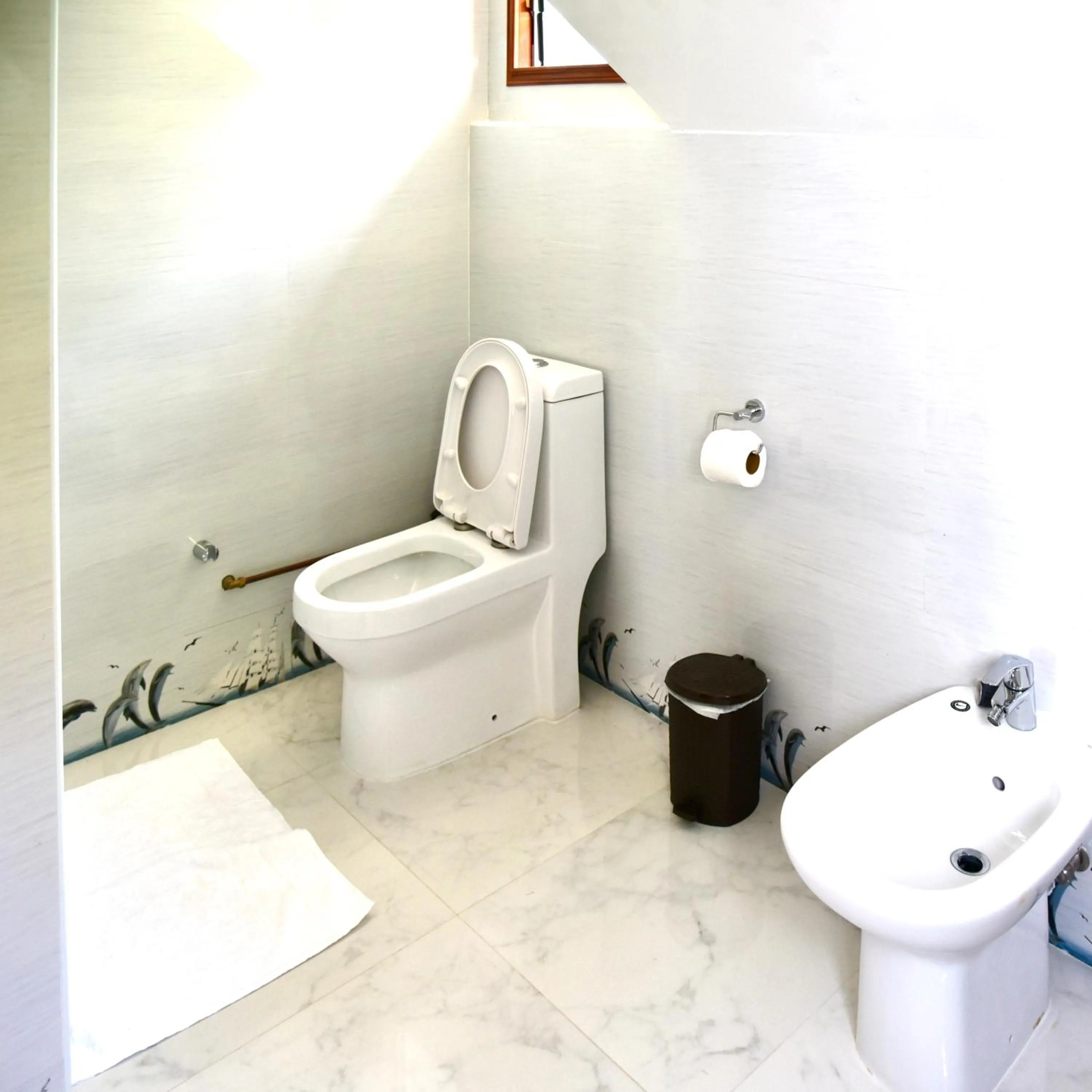 Bathroom in SEA SPLASH SELF CATERING And La Petite Maison