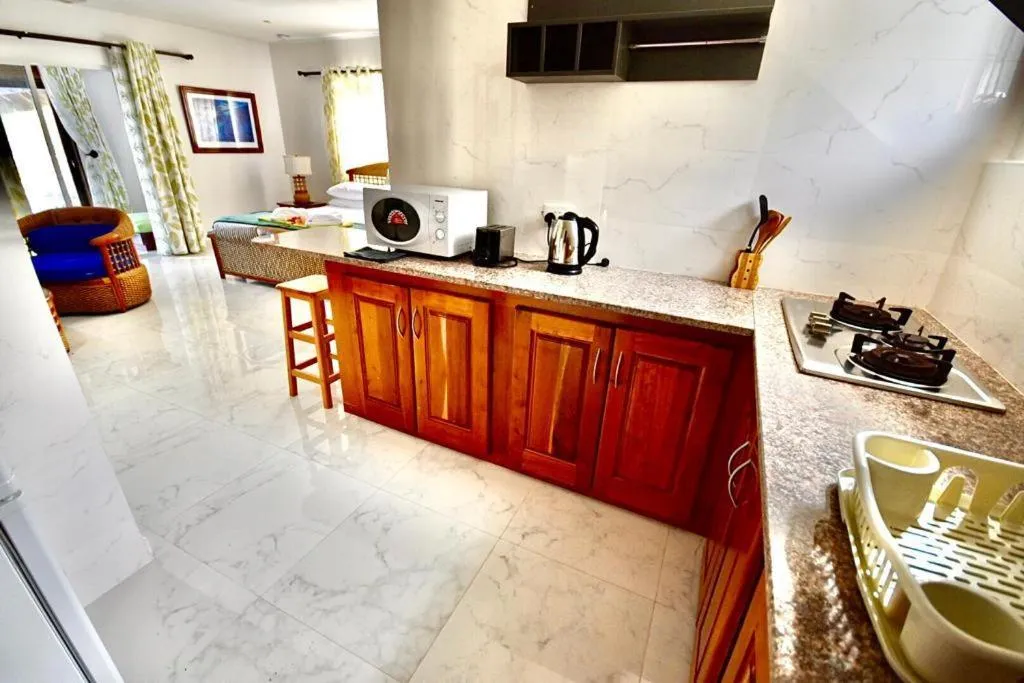 Coffee/tea facilities in SEA SPLASH SELF CATERING And La Petite Maison