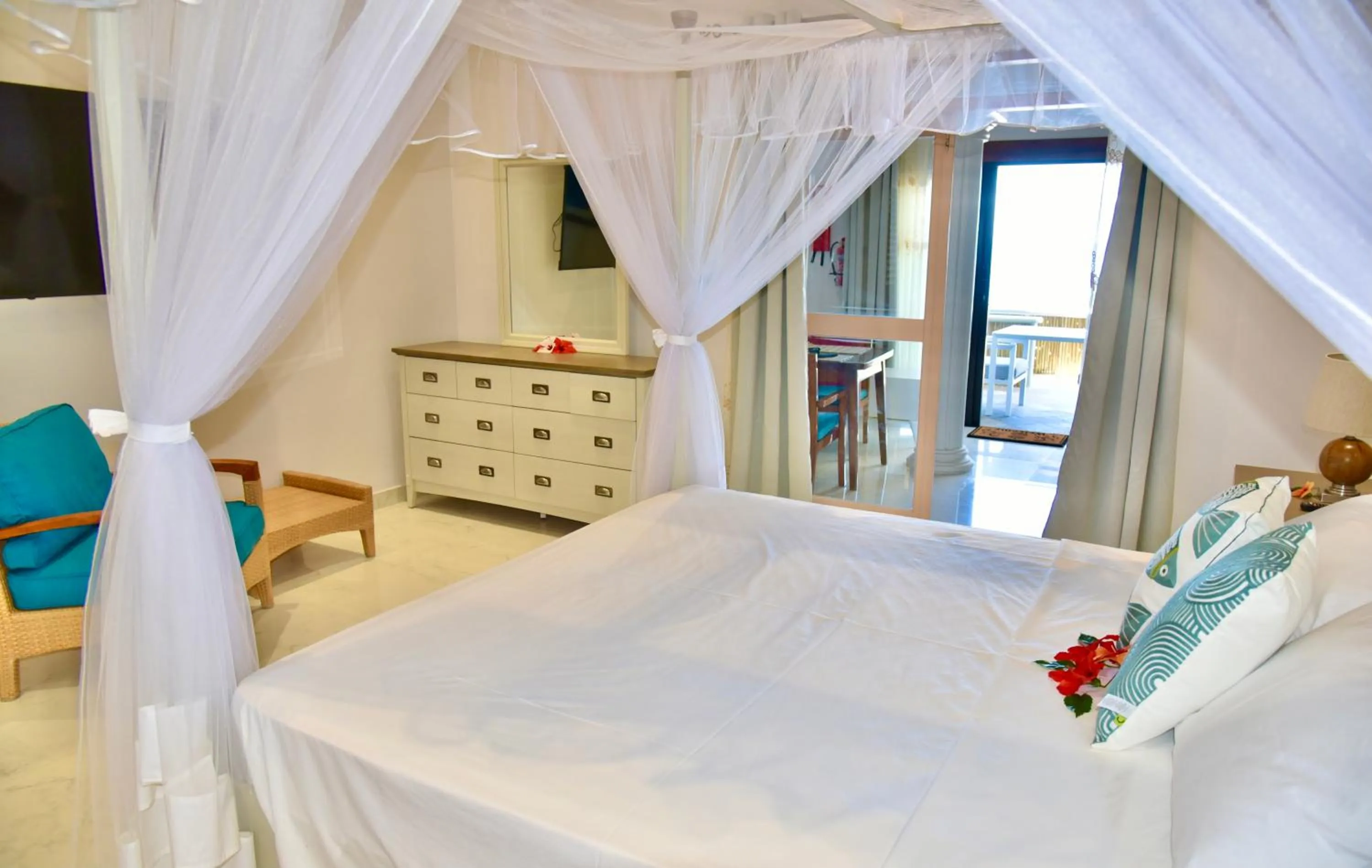 Bed in SEA SPLASH SELF CATERING And La Petite Maison