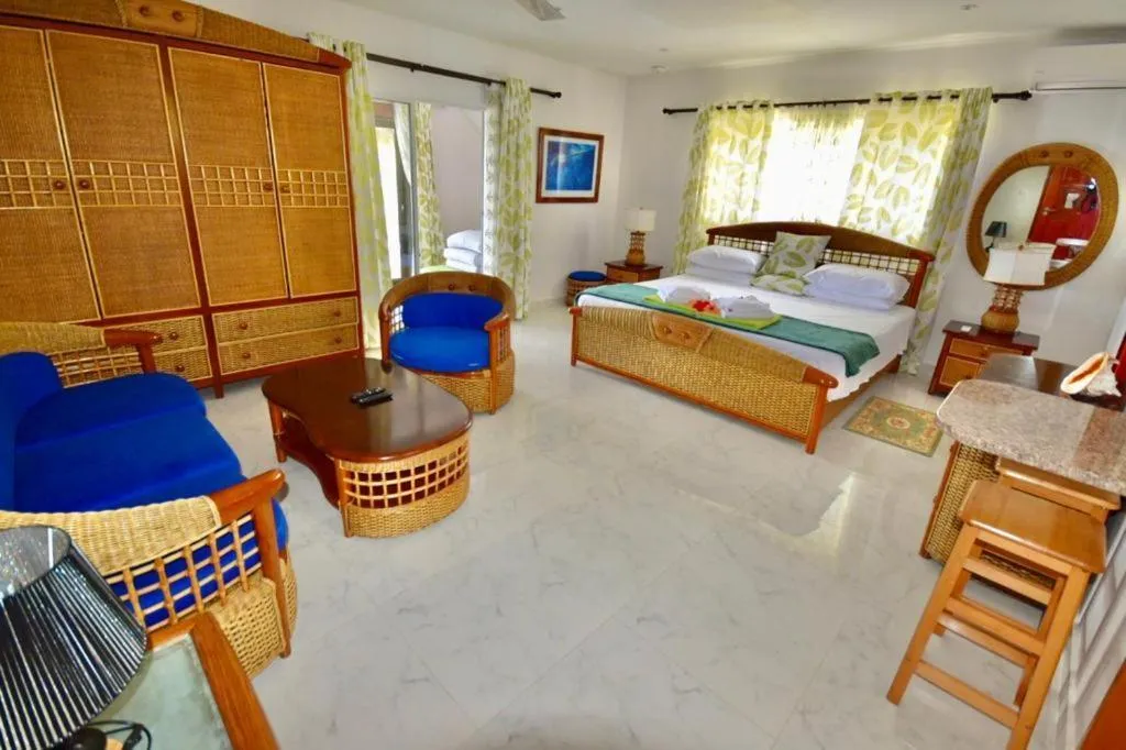 Photo of the whole room, Bed in SEA SPLASH SELF CATERING And La Petite Maison