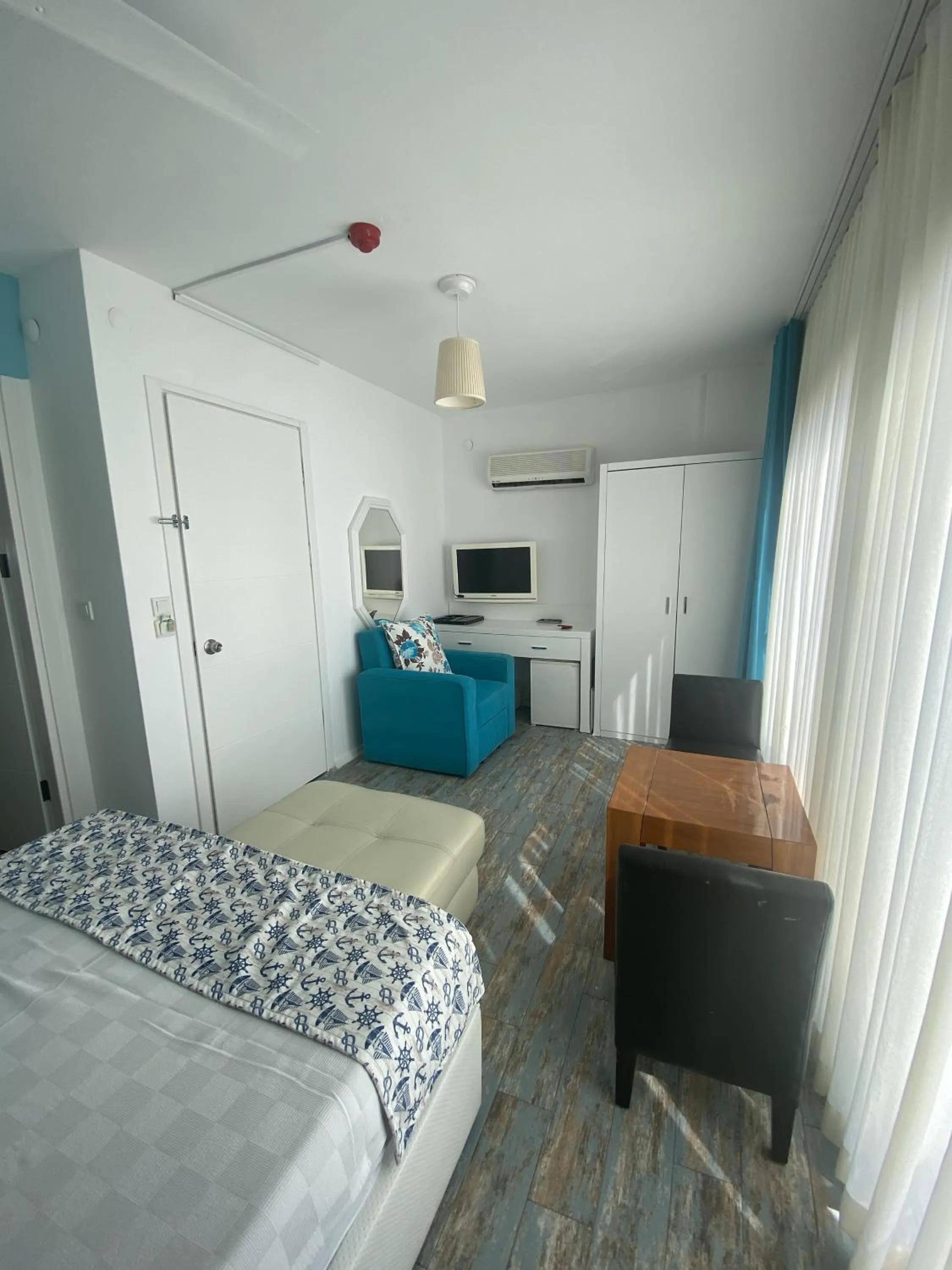 Photo of the whole room, Bed in Larimar Hotel Cesme