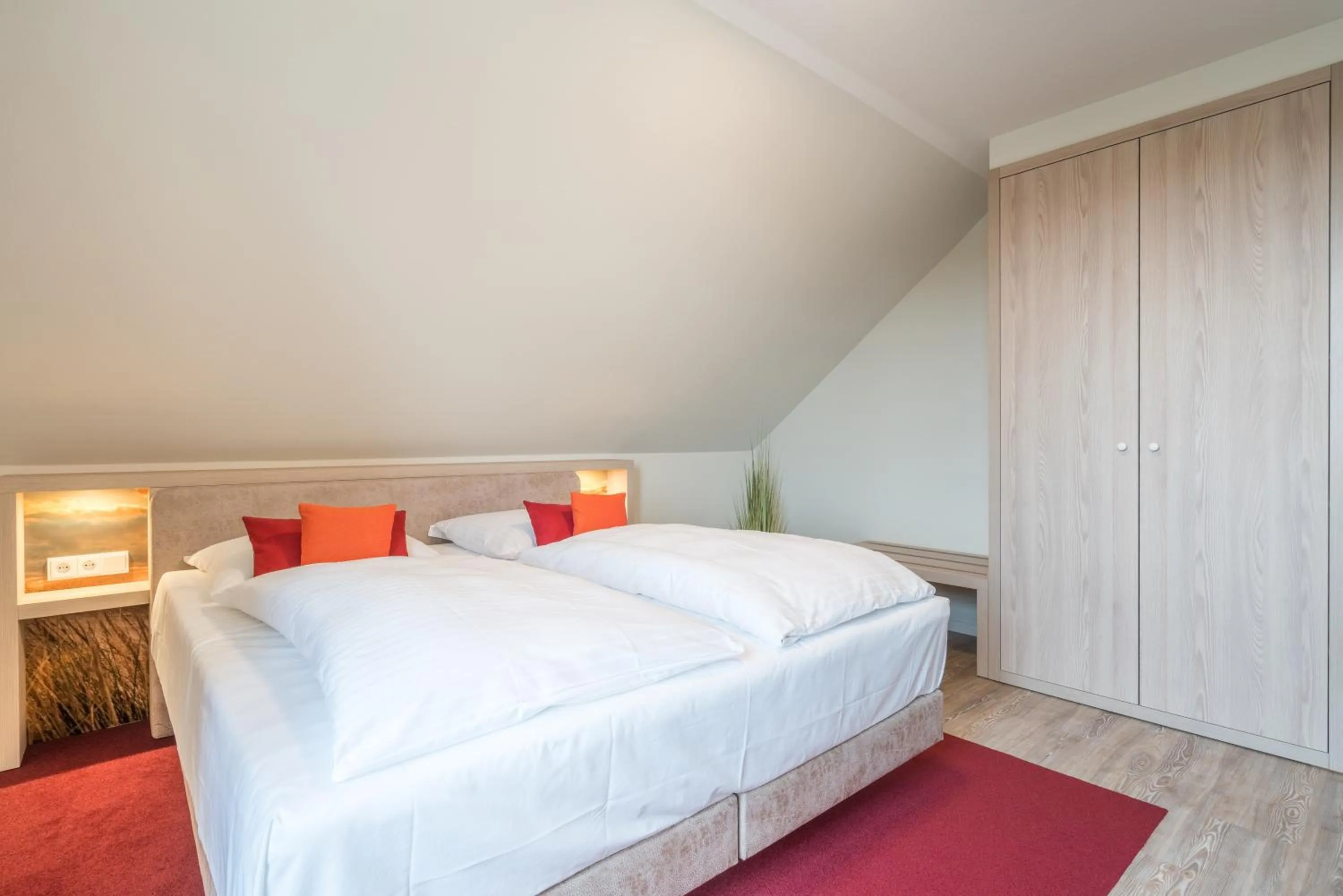 Bed in Hotel Garni Kölfhamm