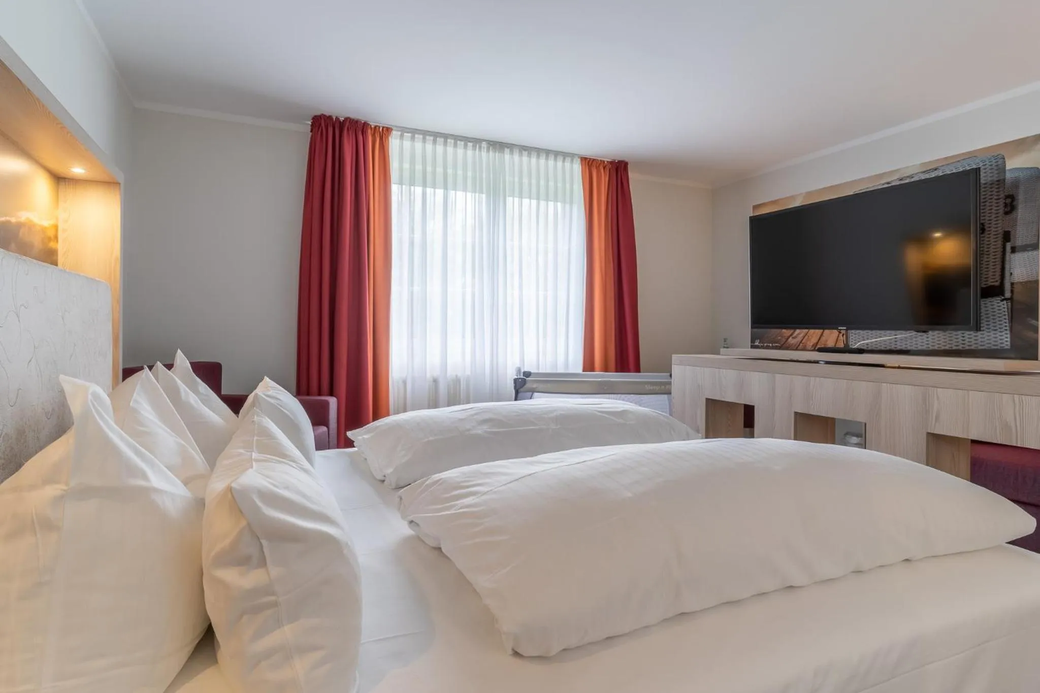 Bed in Hotel Garni Kölfhamm