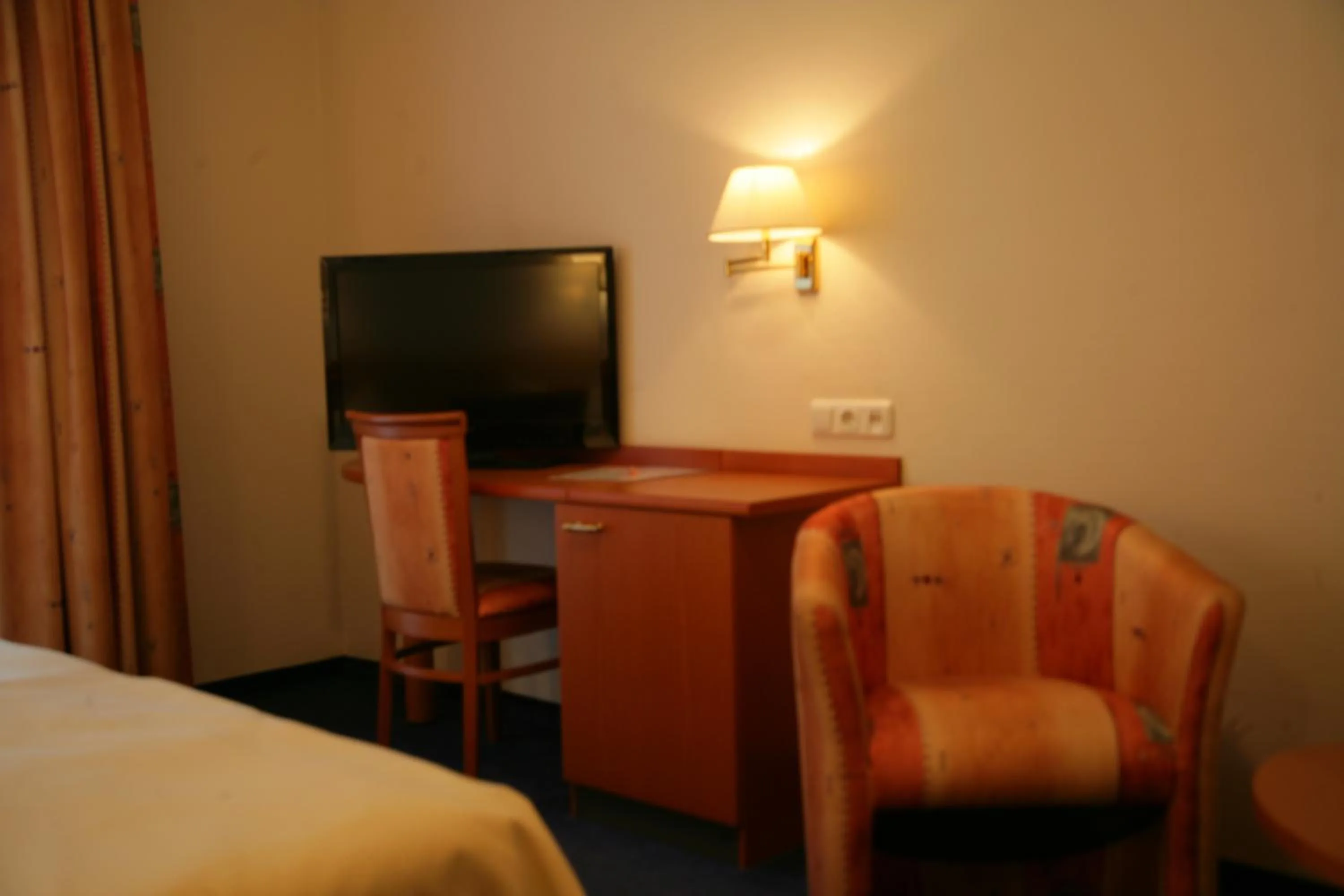 Seating area, Bed in Hotel Wilhelmshöhe