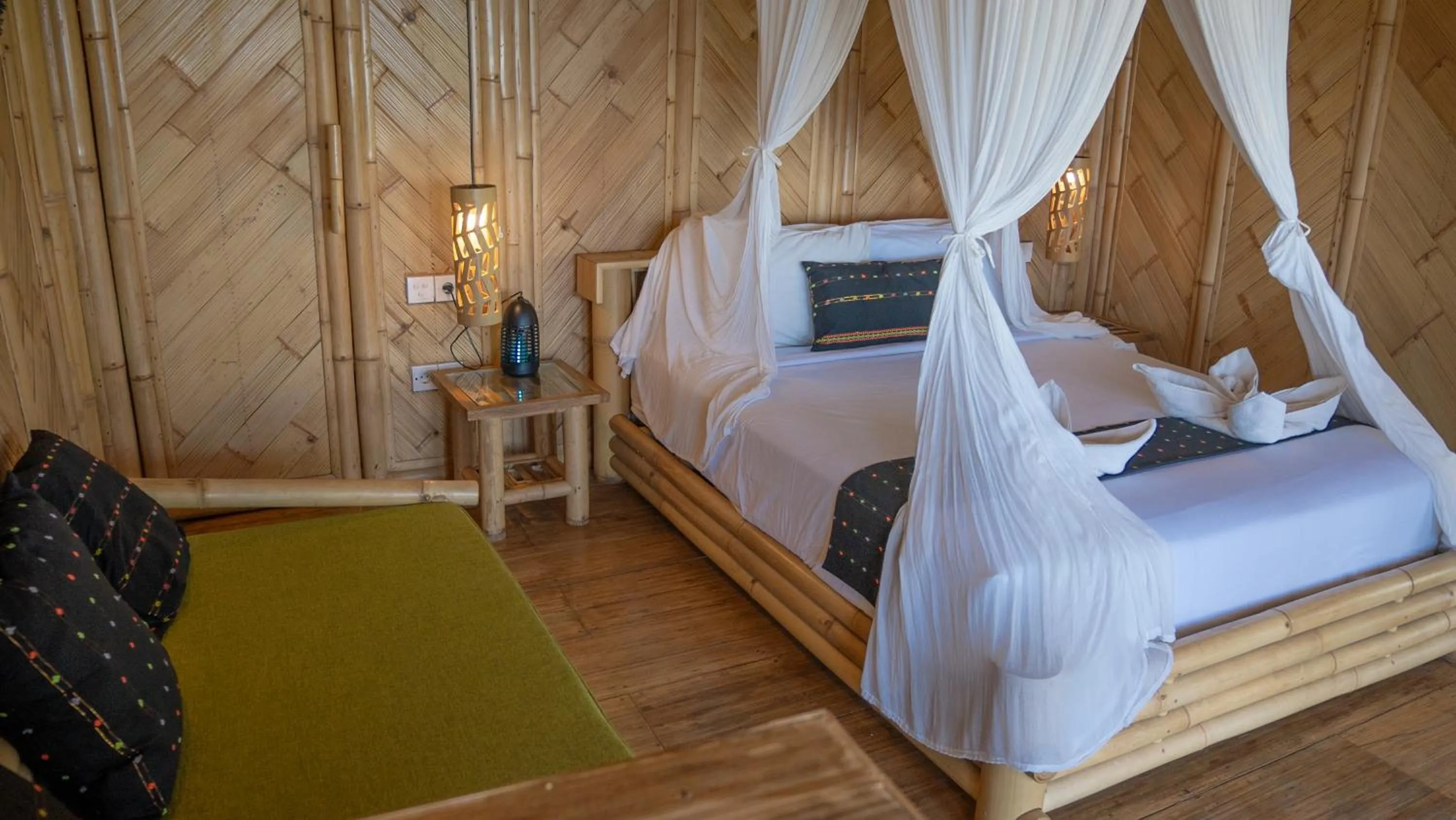 Bed in Elang Hillside Bamboo Villas