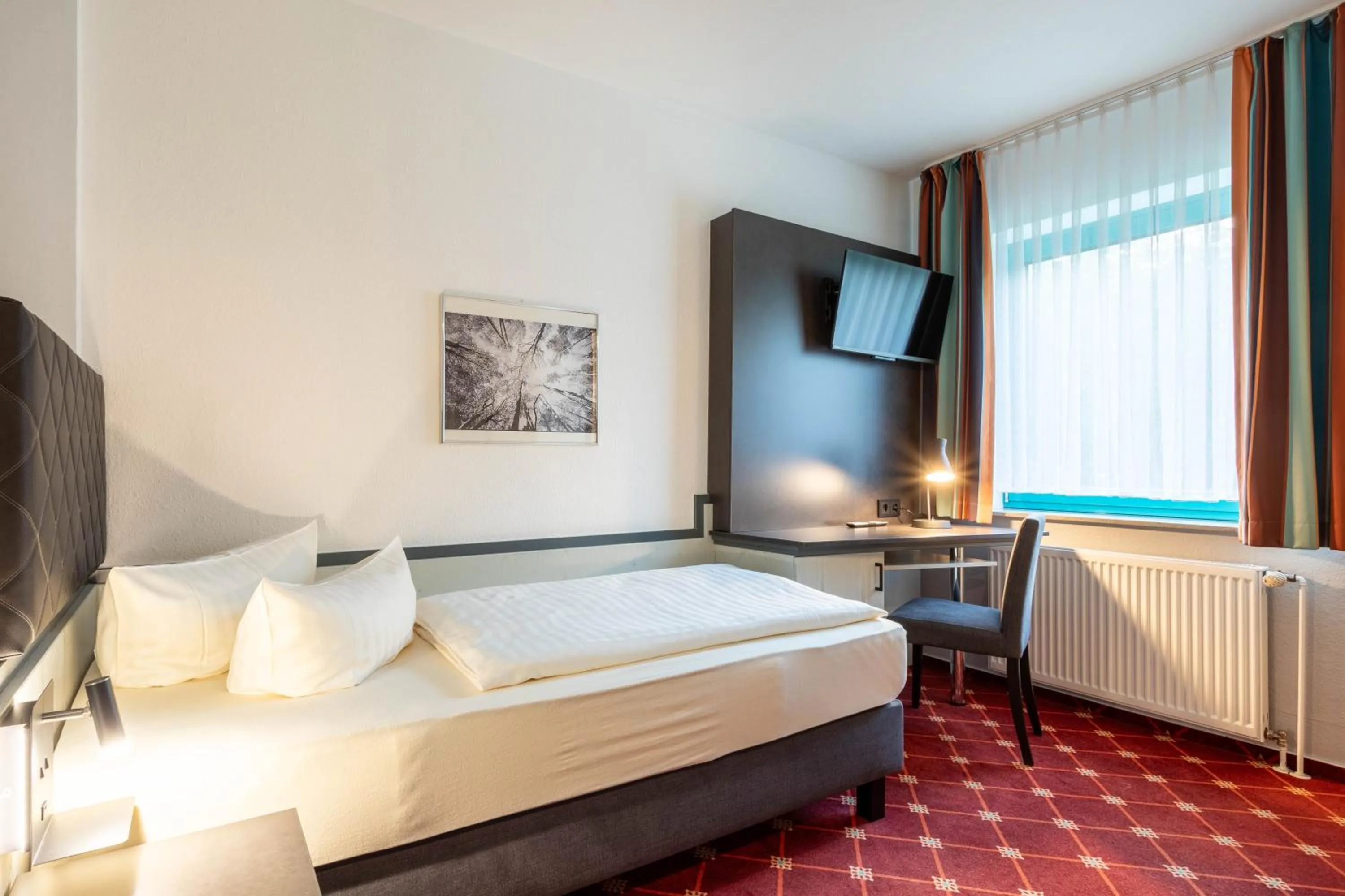 Photo of the whole room, Bed in Montana Trend Hotel Lehrte