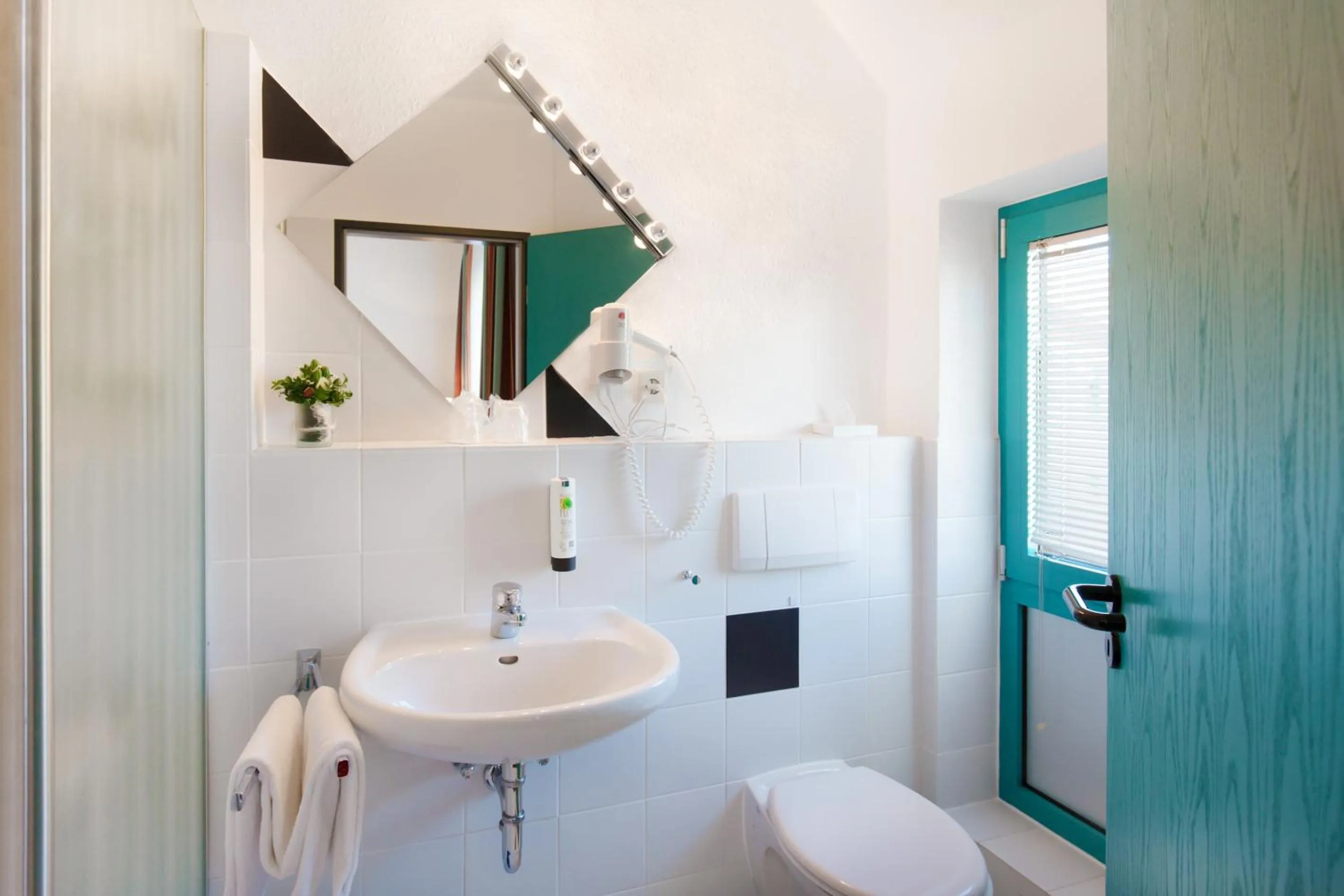 Bathroom in Montana Trend Hotel Lehrte