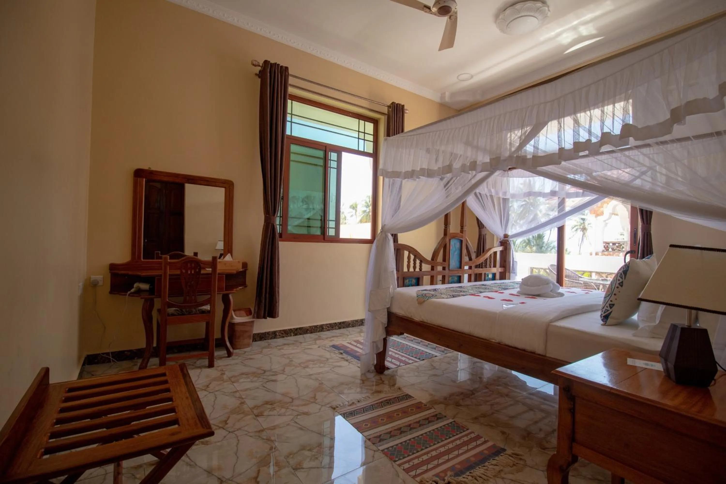 Bed in Sunny Palms Beach Bungalows