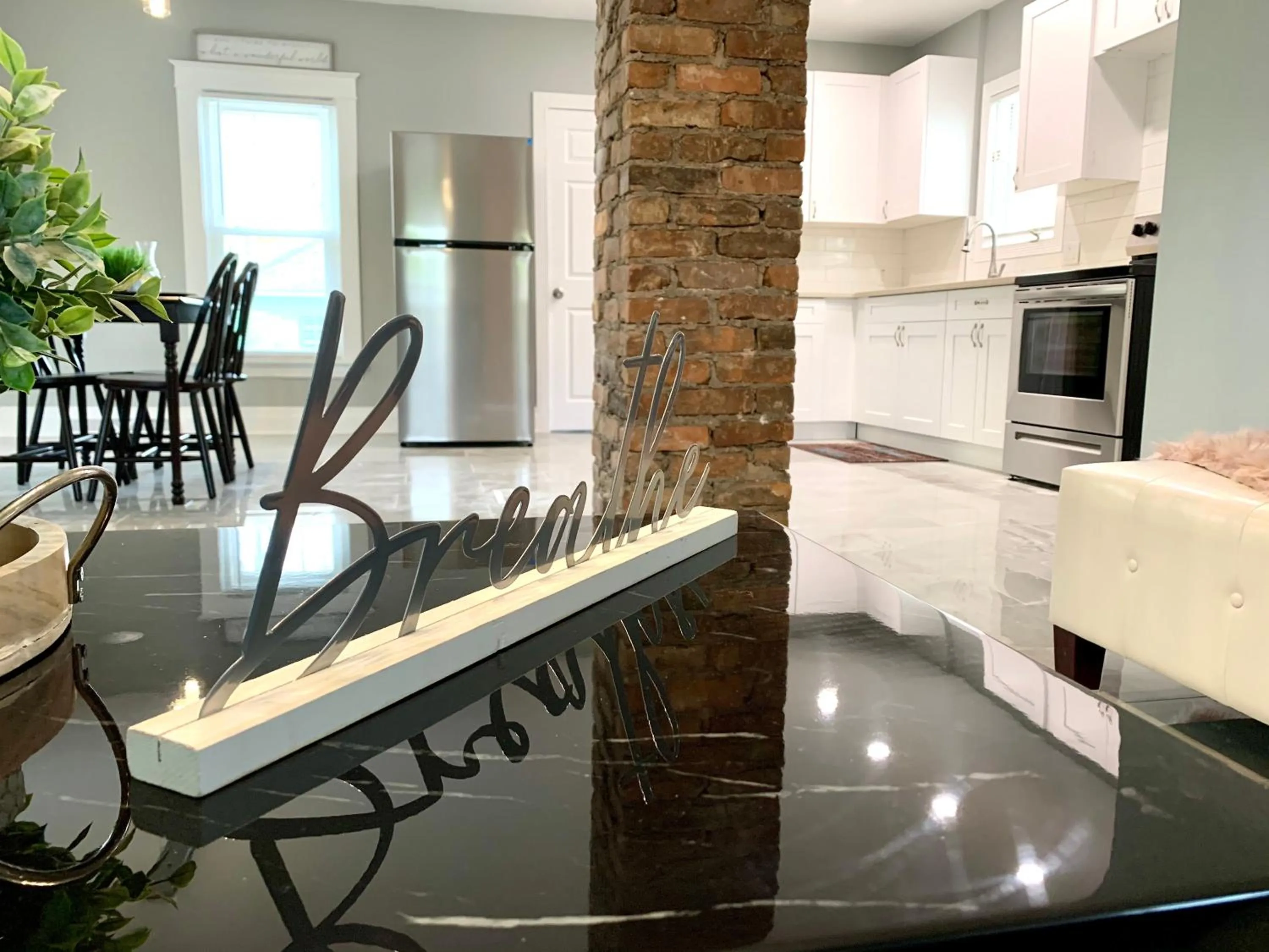 Living room in The Oakwood Cottage- With Private Yard & Parking, Minutes From Falls & Casino by Niagara Hospitality