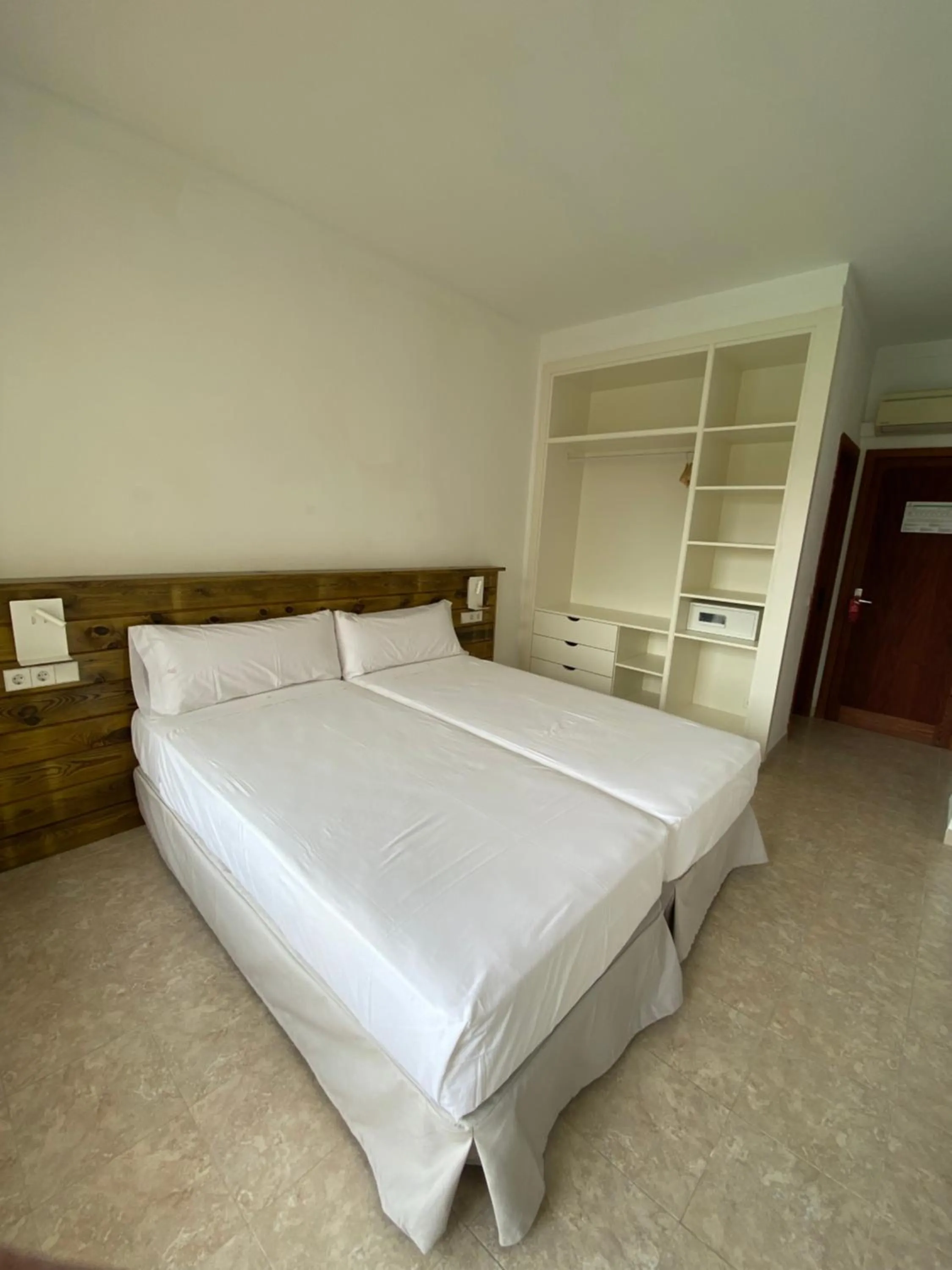 Bed in Hostal Palmaria