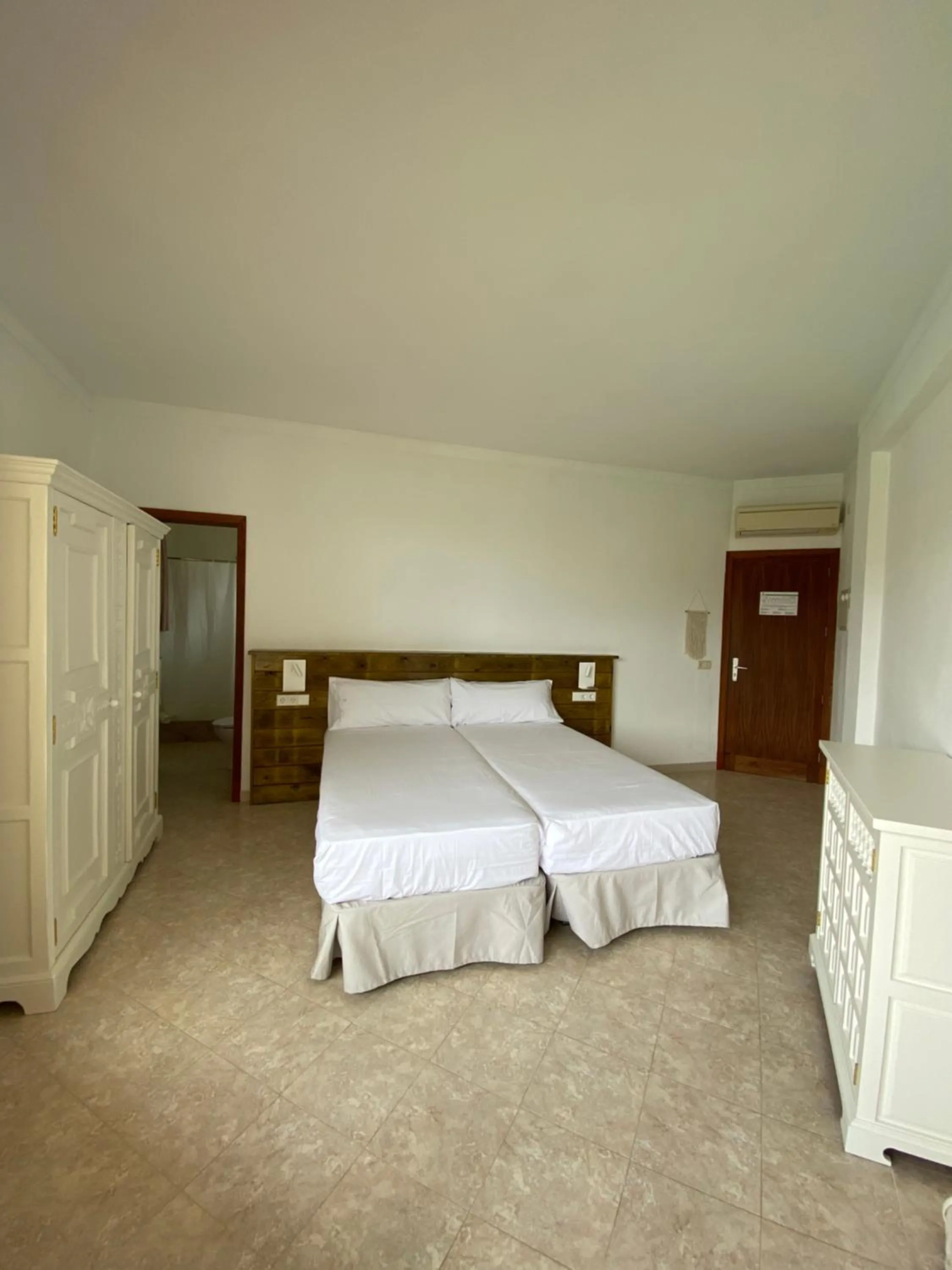 Bed in Hostal Palmaria