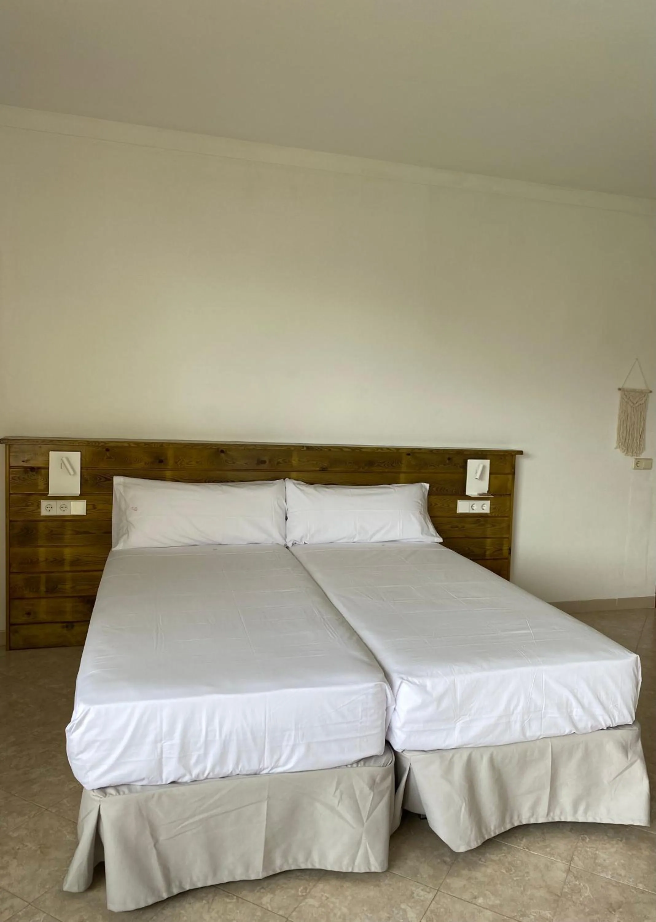 Bed in Hostal Palmaria