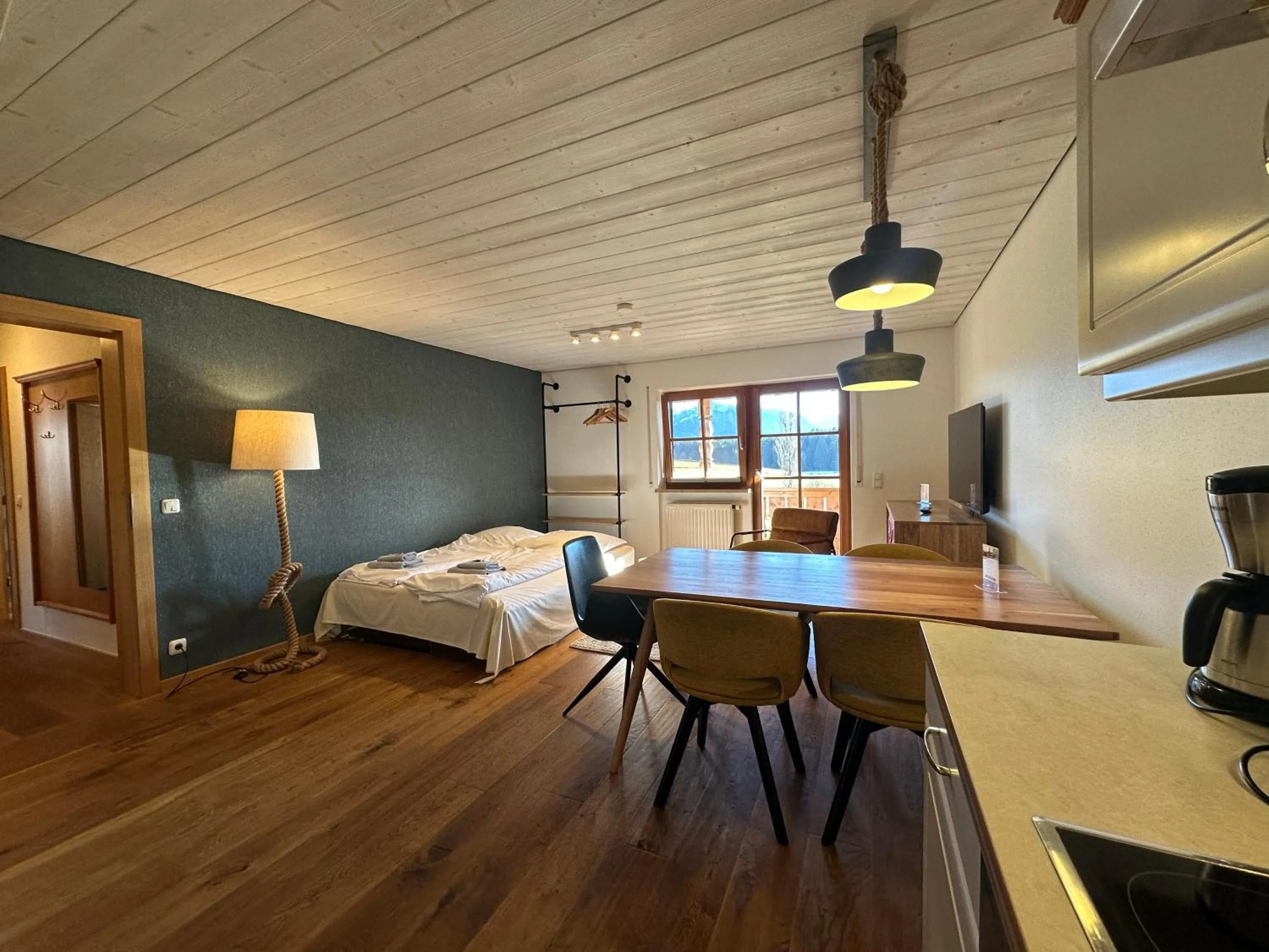 Kitchen or kitchenette, Bed in Landhaus Kössel