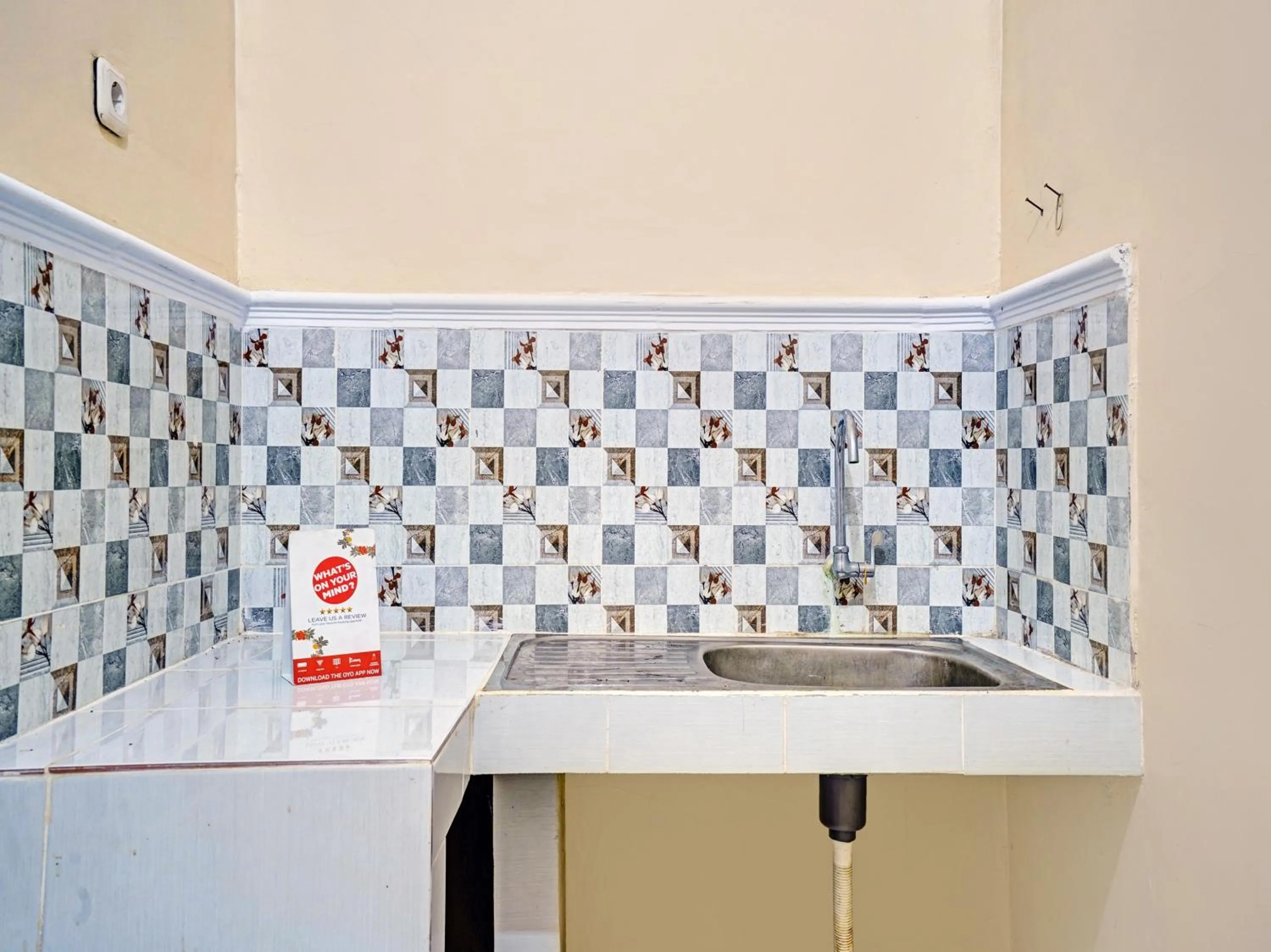 Kitchen or kitchenette in OYO 90416 Wisma Wayang Ajen Syariah