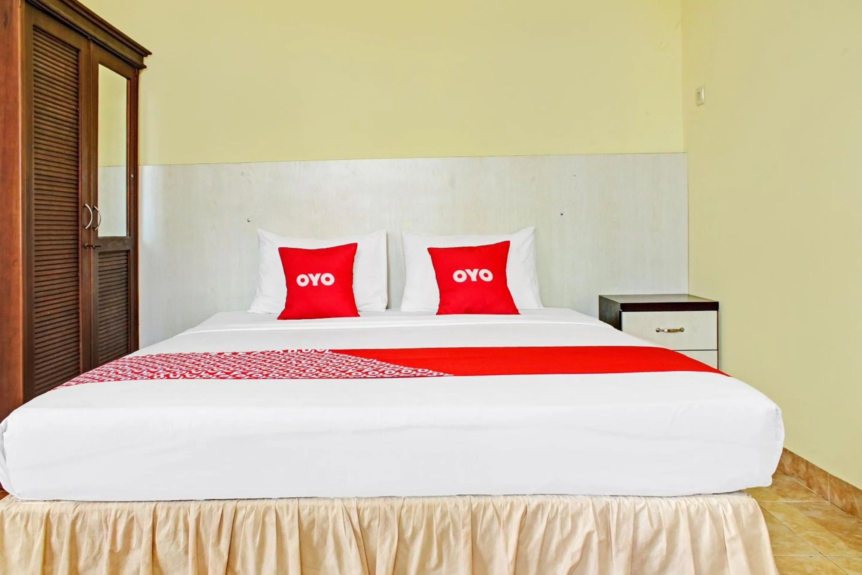 Bedroom in Hotel O Aman