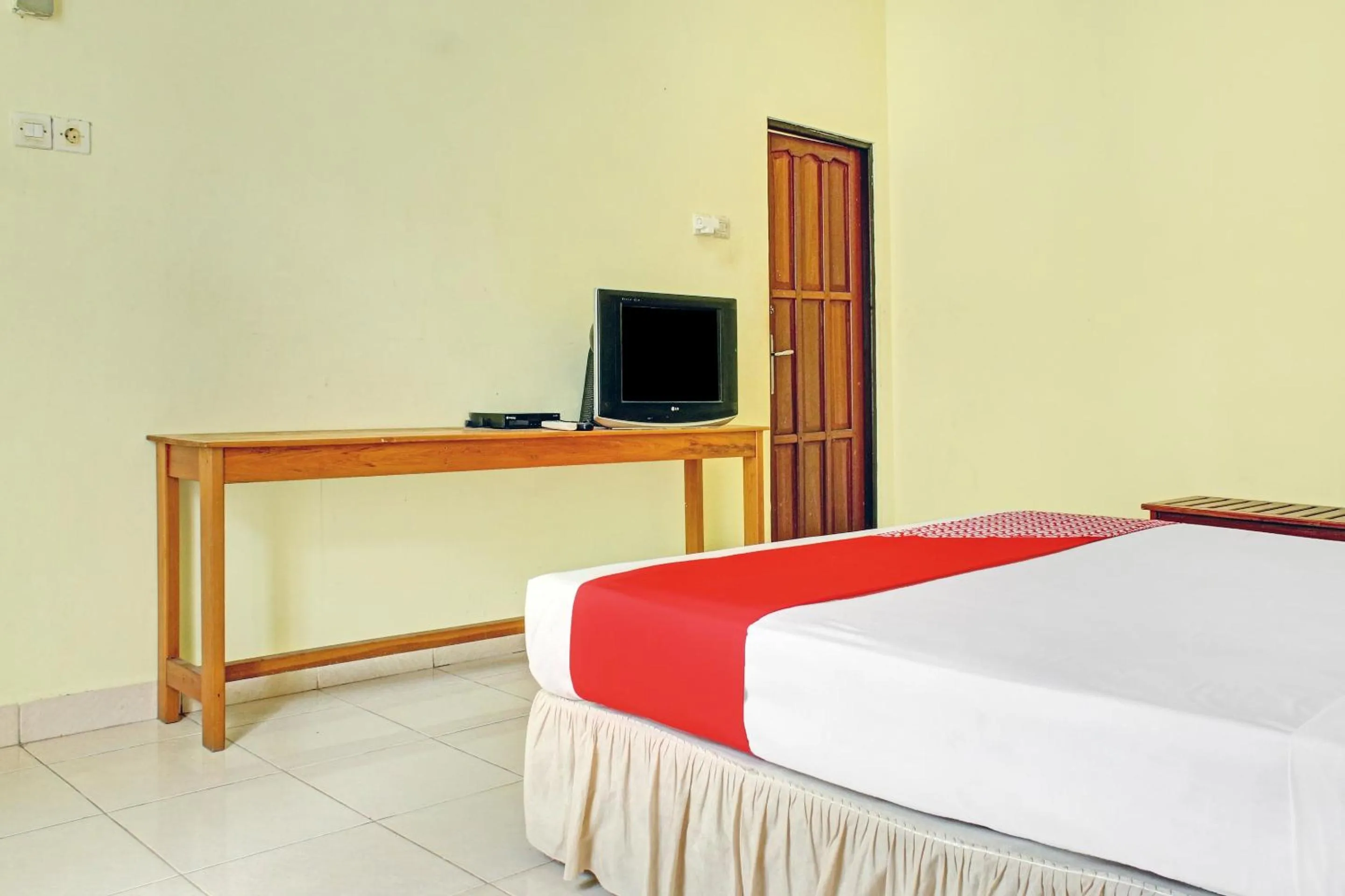 Bedroom in Hotel O Aman