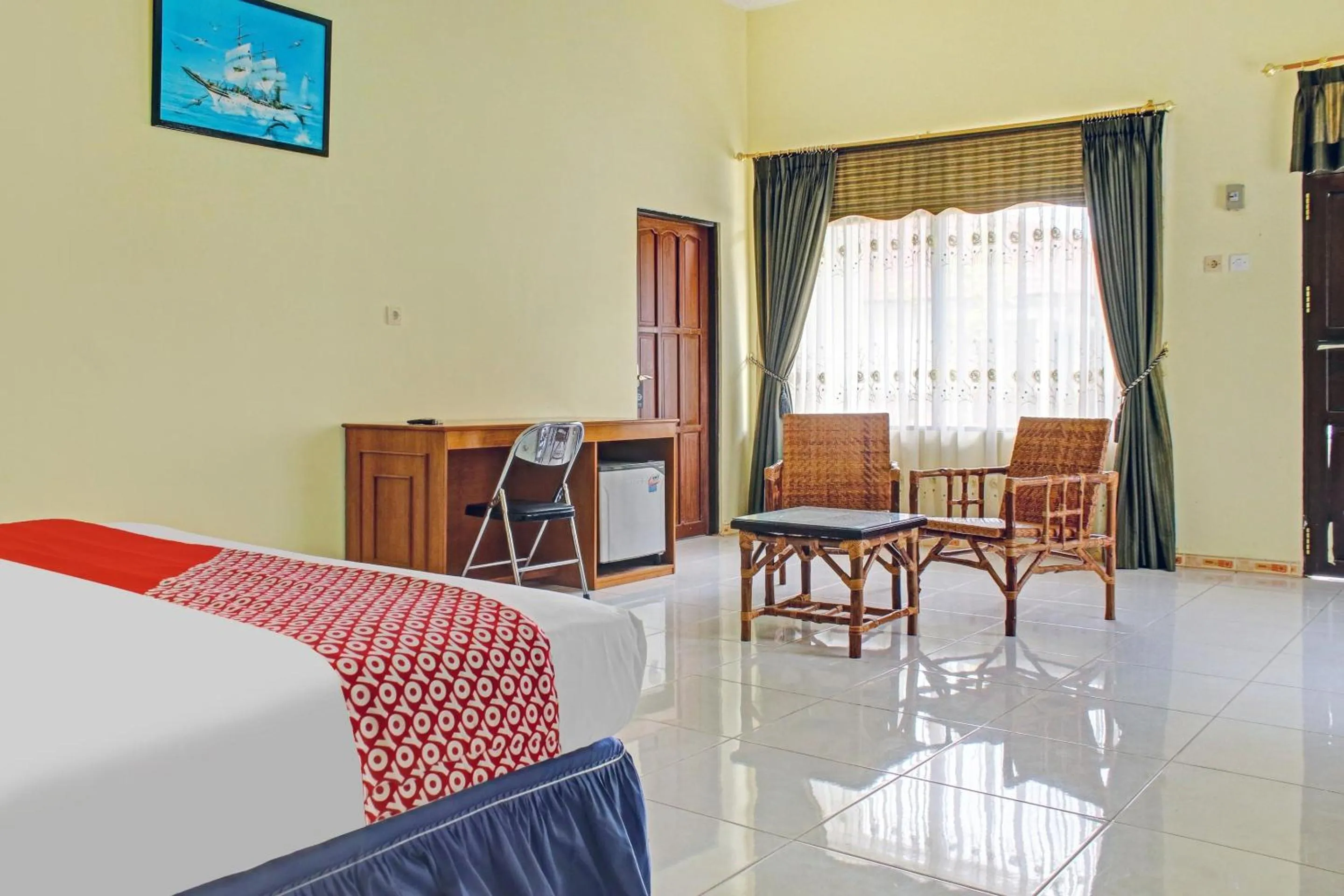 Bedroom in Hotel O Aman