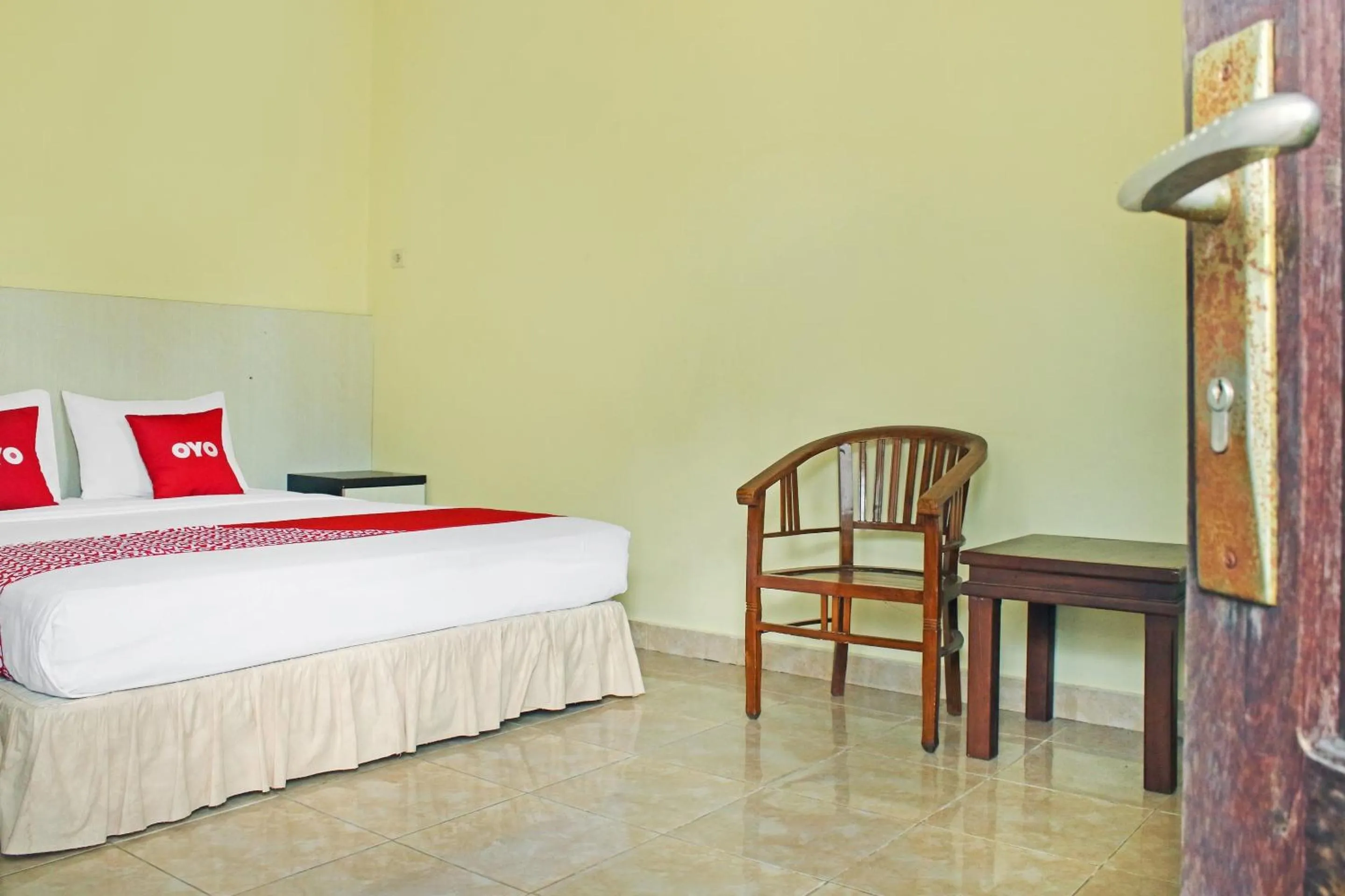 Bedroom in Hotel O Aman