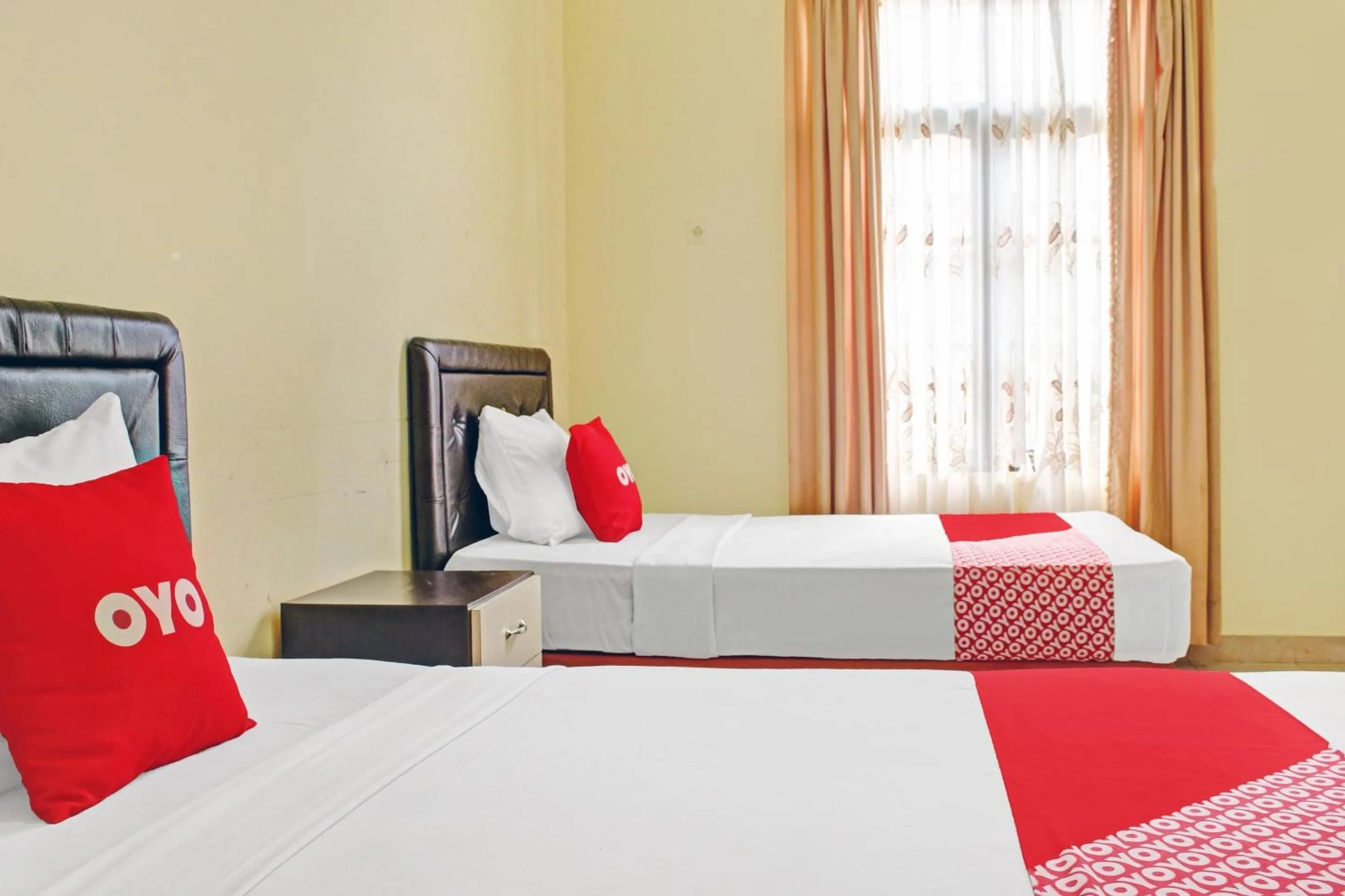 Bedroom in Hotel O Aman