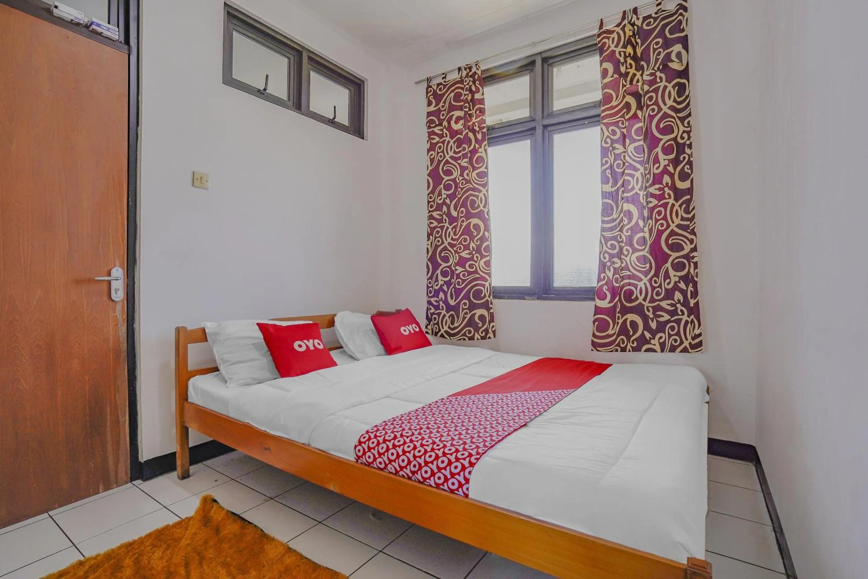 Bedroom in OYO 90352 Villa Agape 2