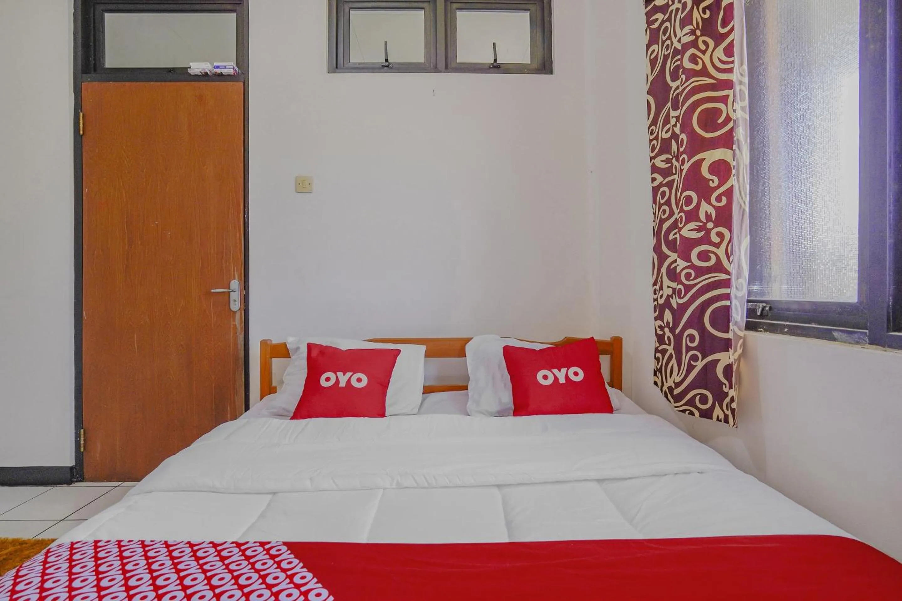 Bedroom in OYO 90352 Villa Agape 2