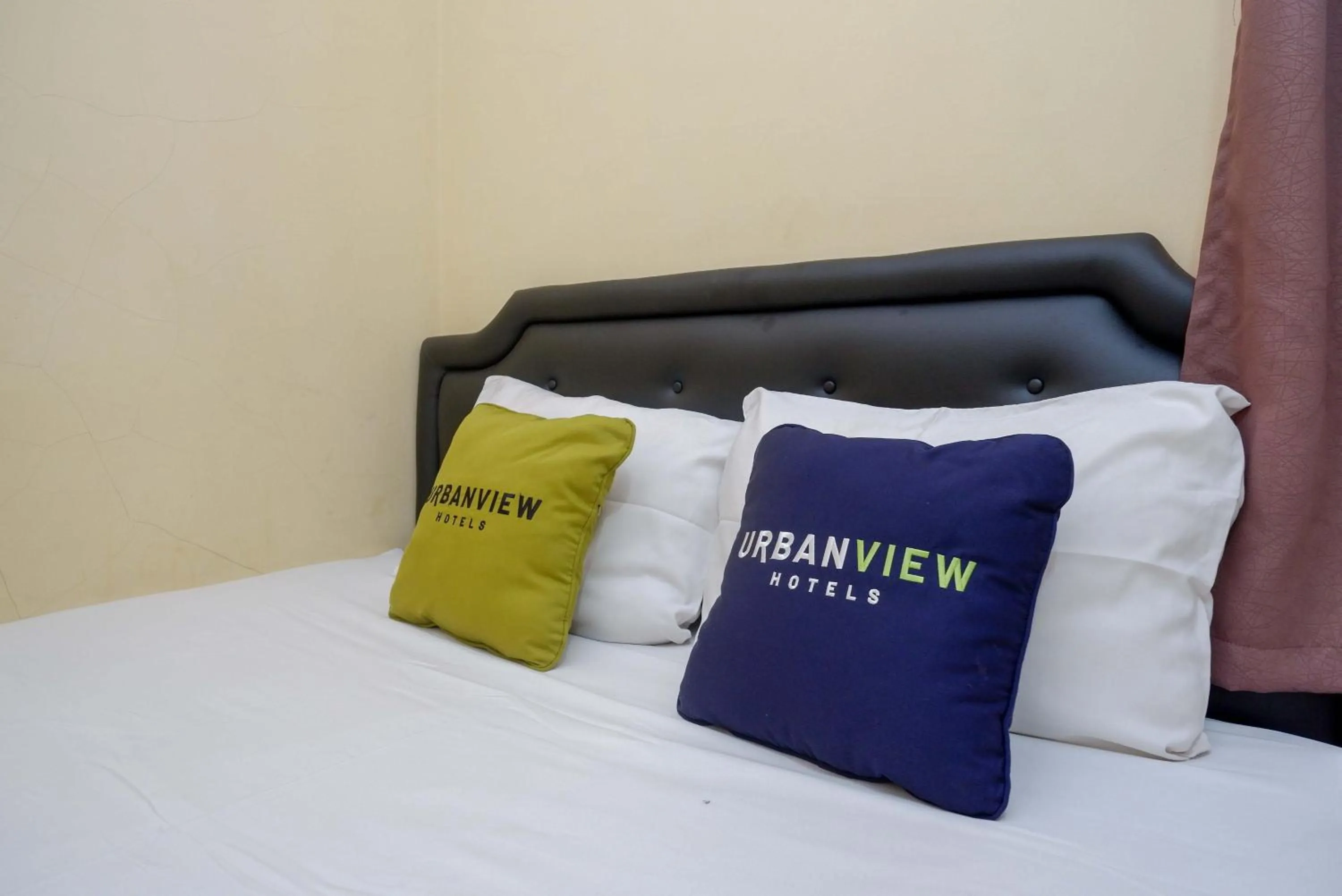Bedroom, Bed in Urbanview Hotel Jogja City Mall