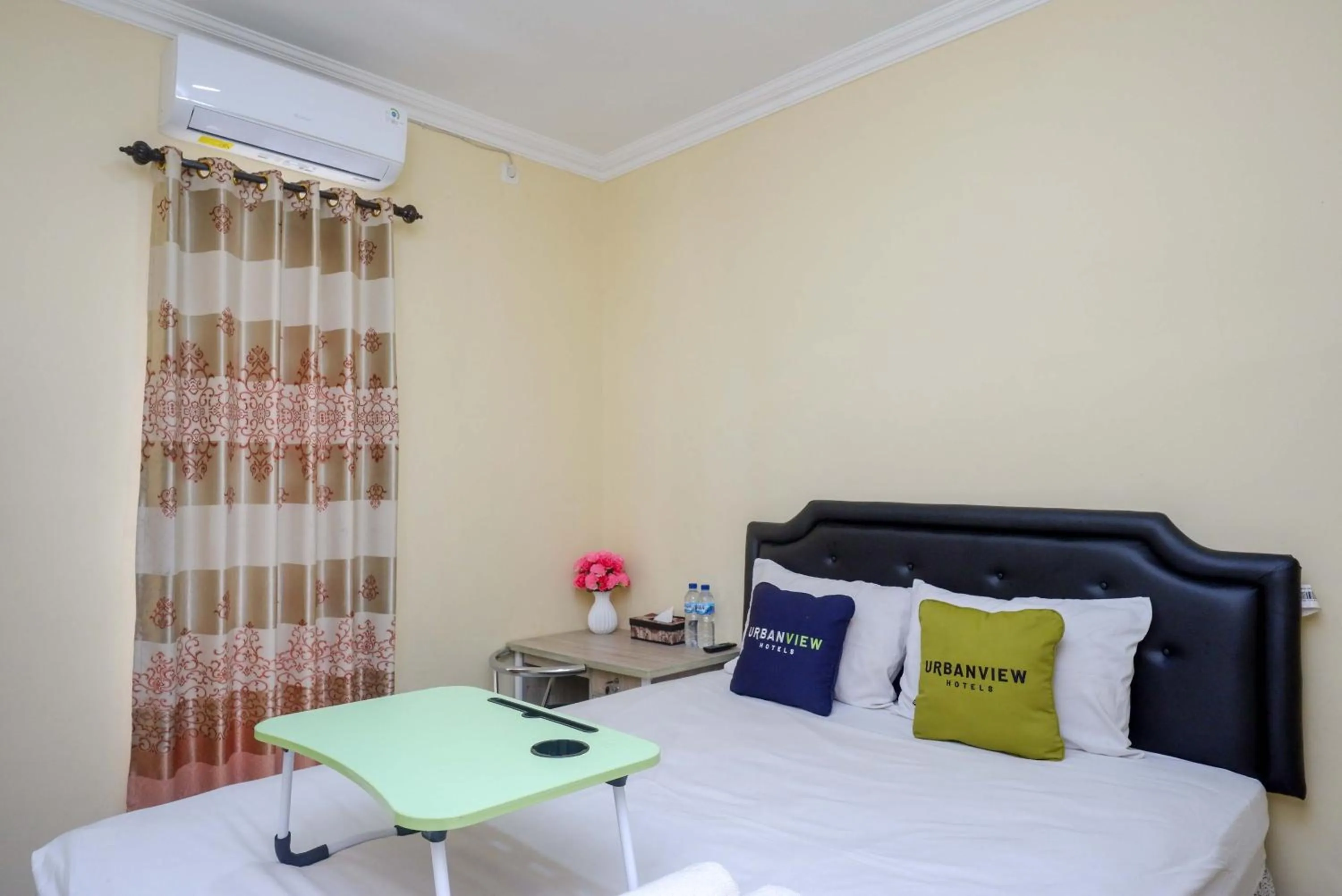 Bedroom, Bed in Urbanview Hotel Jogja City Mall