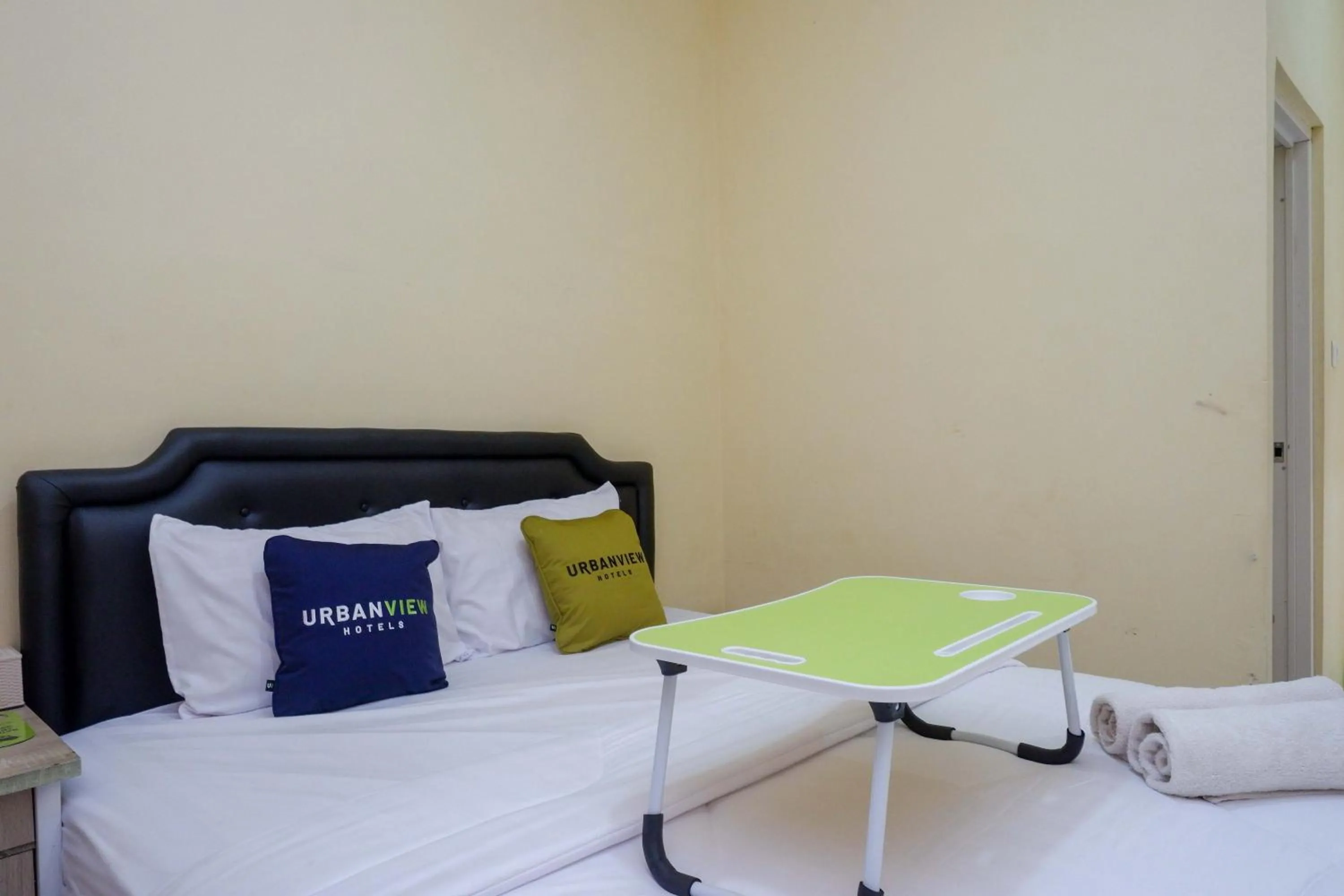 Bedroom, Bed in Urbanview Hotel Jogja City Mall