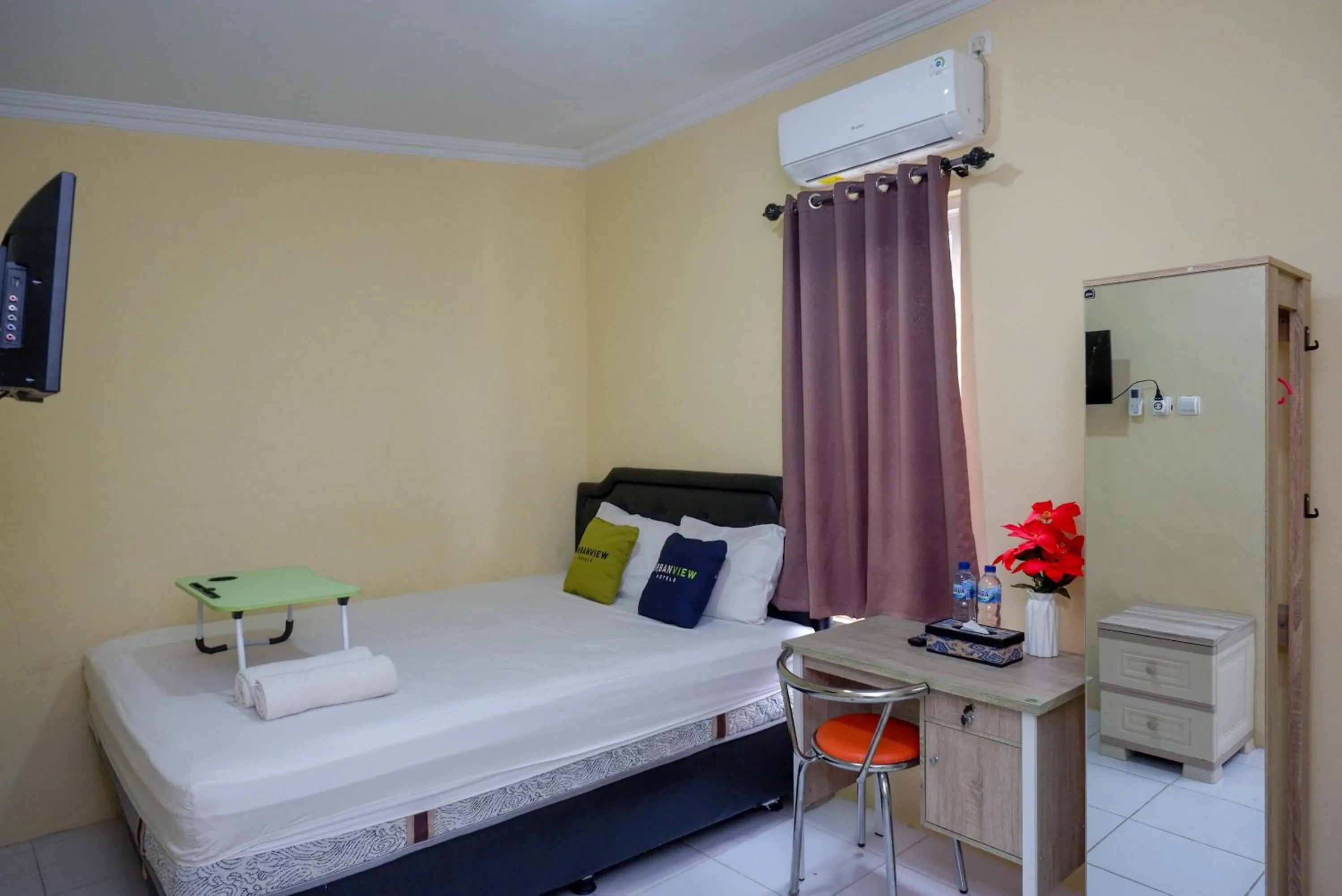 Bedroom, Bed in Urbanview Hotel Jogja City Mall