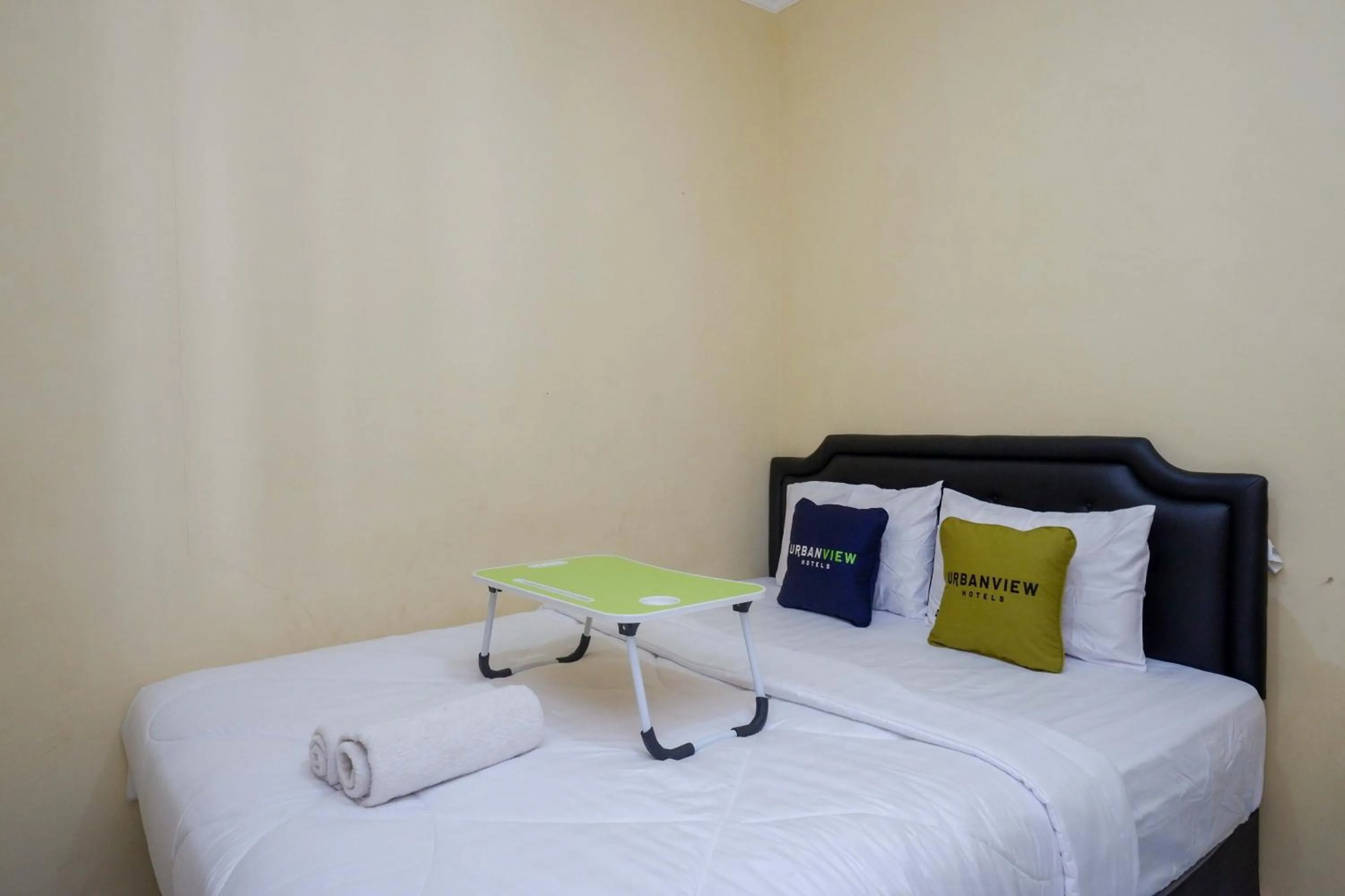 Bedroom, Bed in Urbanview Hotel Jogja City Mall